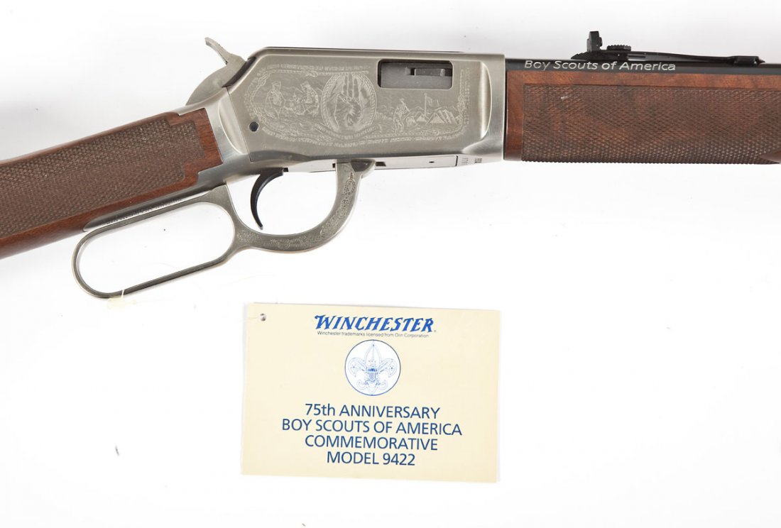 Winchester Model 9422 Boy Scouts 75th Ann. - .22: SERIAL #: BSA8788 DATE OF MANF: 1985 (1 of 15,000) DESIGN: Lever action with tubular magazine. 20-1/2” barrel. MATERIAL/FINISH COMPOSITION: Blued steel barrel, magazine and trigger. Brushed nickel f