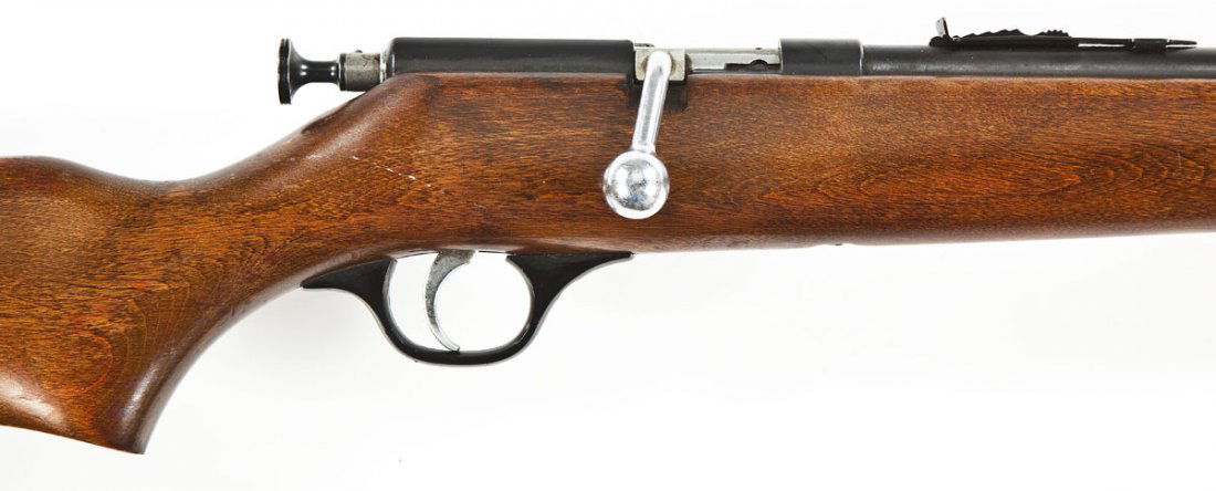 J.C. Higgins Model 103.18 Rifle - .22 Cal.: SERIAL #: None DESIGN: Single shot bolt action. 24" barrel. MATERIAL/FINISH COMPOSITION: Blued steel except for the bolt and trigger. Wood pistol grip stock. Black plastic trigger guard. FEATURES: Bla