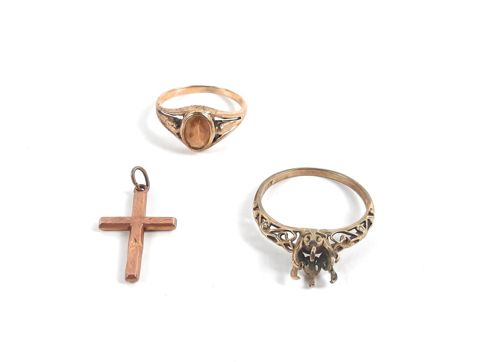 3 Pcs 10K Gold Jewelry: Child's ring with citrine (worn), size 3-1/2. Setting size 7-1/4. Cross pendant 3/4" high. Total weight 3.7 grams.