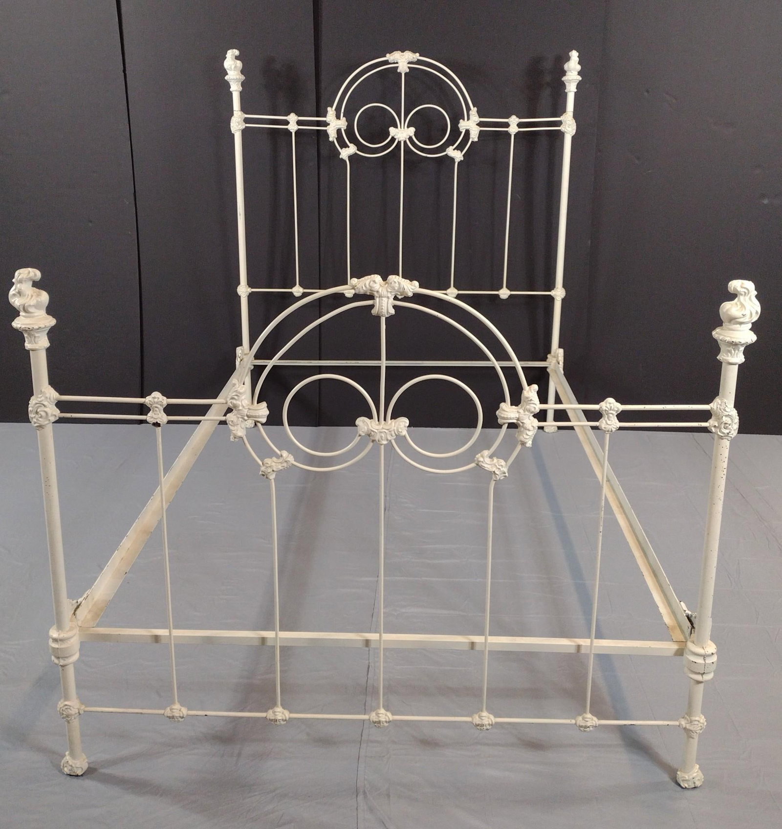 White Painted Metal Bed: NOT ELIGIBLE FOR IN-HOUSE SHIPPING. 53-1/2" wide X 81-1/2" deep X 61-3/4" high.