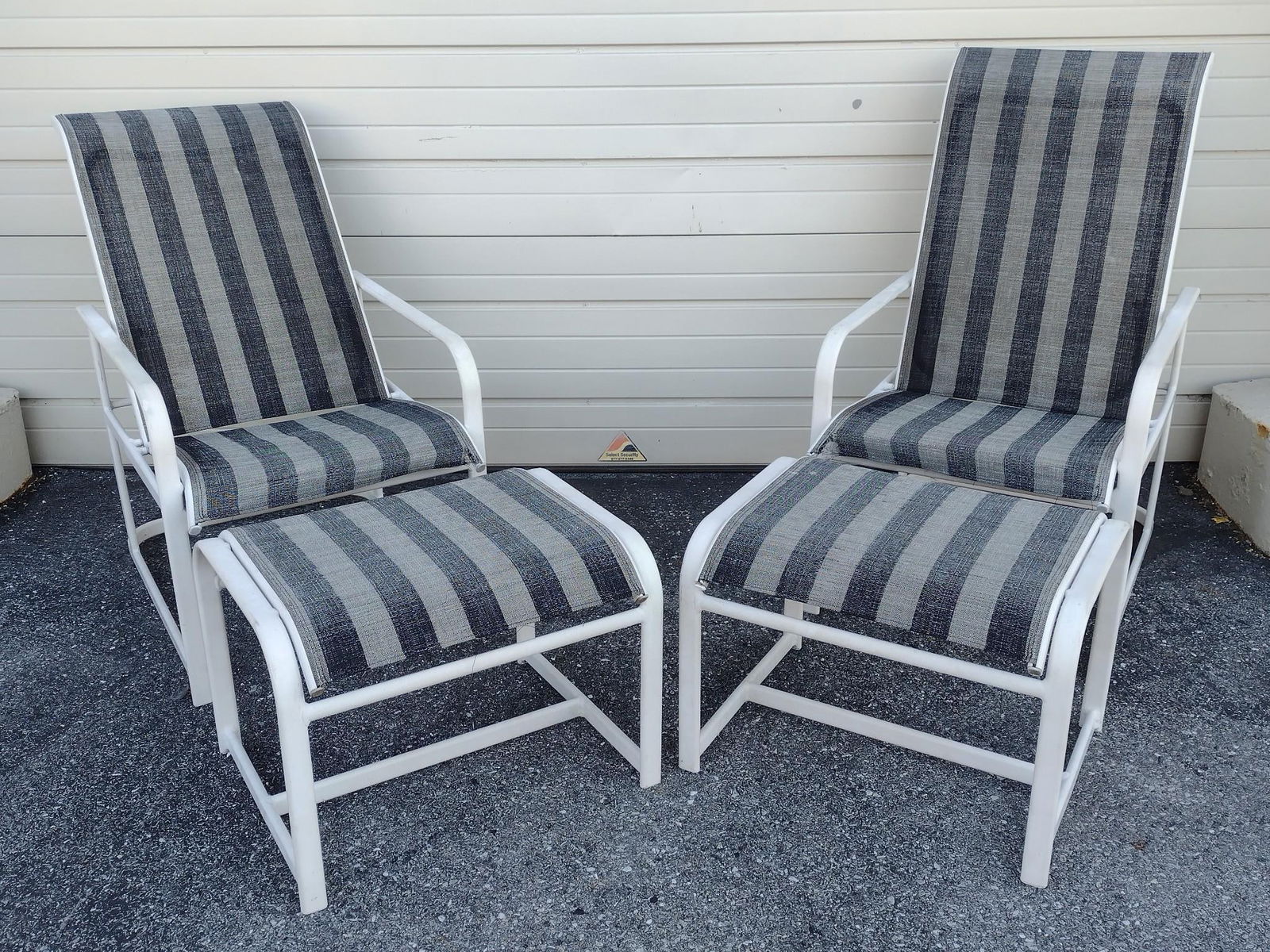 Pair of Winston Reclining Chairs & Ottomans: NOT ELIGIBLE FOR IN-HOUSE SHIPPING. Chairs 24" wide X 32" deep X 42" high. Ottomans 24" wide X 20" deep X 18" high. Both with damage to seats.