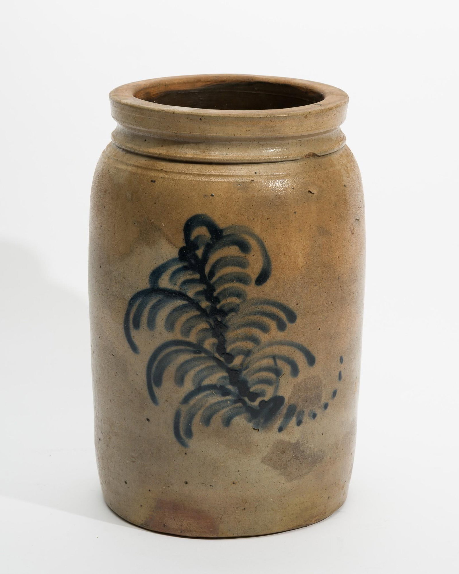 Antique Crock with Cobalt Fern Decoration: 7-1/4" diameter x 11" high. Some discoloration to stoneware. Some chips to top rings.