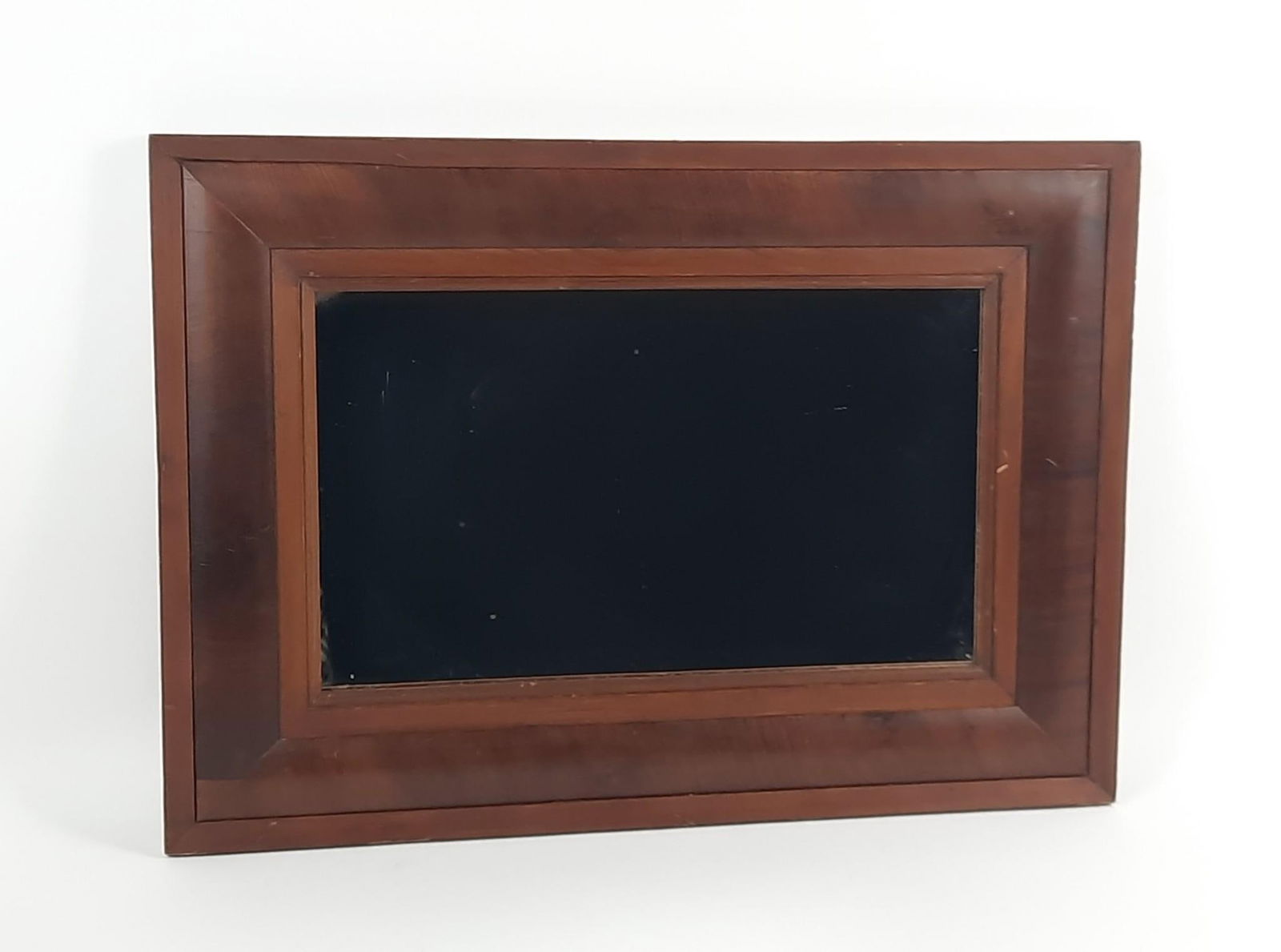 Vintage Mirror with Wood Frame: NOT ELIGIBLE FOR IN-HOUSE SHIPPING. Overall with frame: 20-1/4" high x 28-1/4" wide. Some wear to frame.