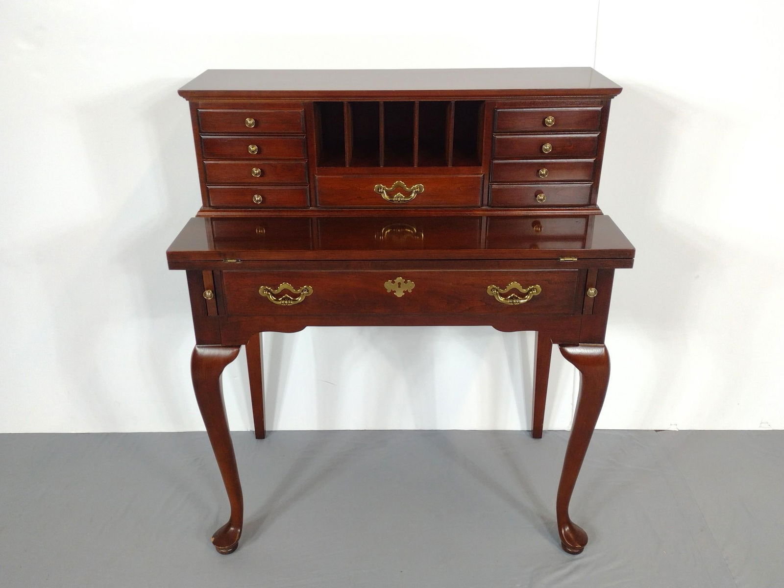 Thomasville Ladies Writing Desk: NOT ELIGIBLE FOR IN-HOUSE SHIPPING. 34" wide X 25" deep X 40-1/4" high. Has some light scratches.