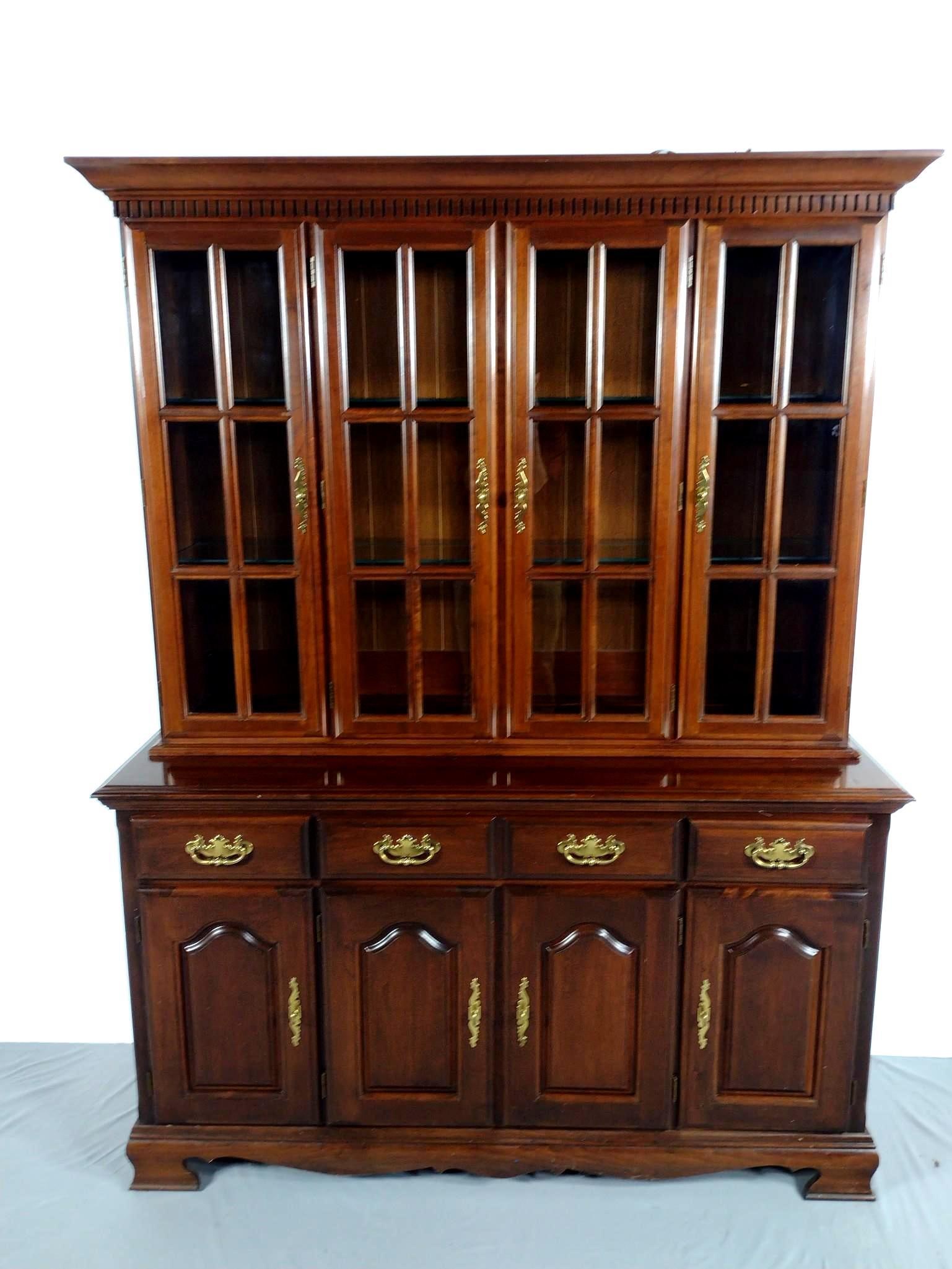 China Cabinet: NOT ELIGIBLE FOR IN-HOUSE SHIPPING. 59" wide X 20" deep X 77" high. Has a few light scratches. No manufactures name found.