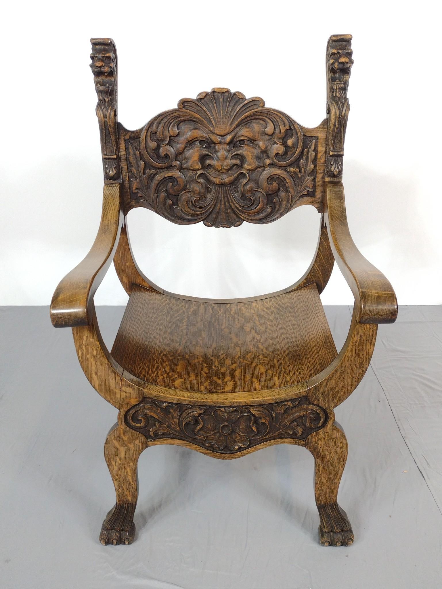 Carved Oak Man of the North Wind Chair: NOT ELIGIBLE FOR IN-HOUSE SHIPPING. 24-1/2" wide X 22" deep X 41-1/2" high. Has some light wear and finish loss.