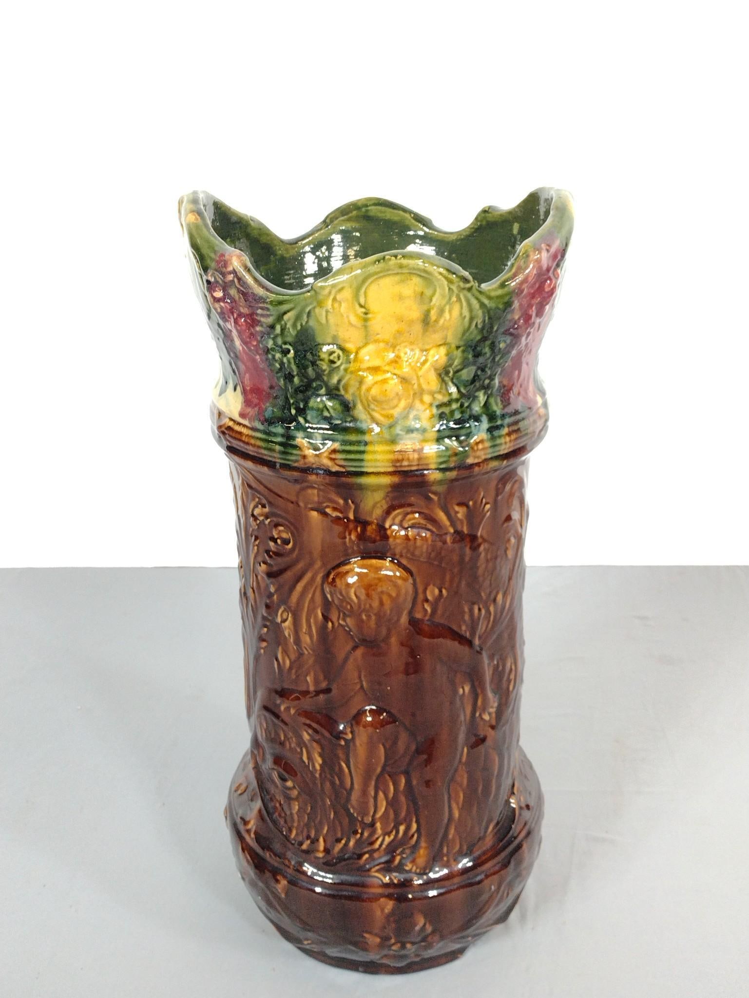 Majolica Umbrella Stand: NOT ELIGIBLE FOR IN-HOUSE SHIPPING. Unmarked. 11" diameter X 24" high.