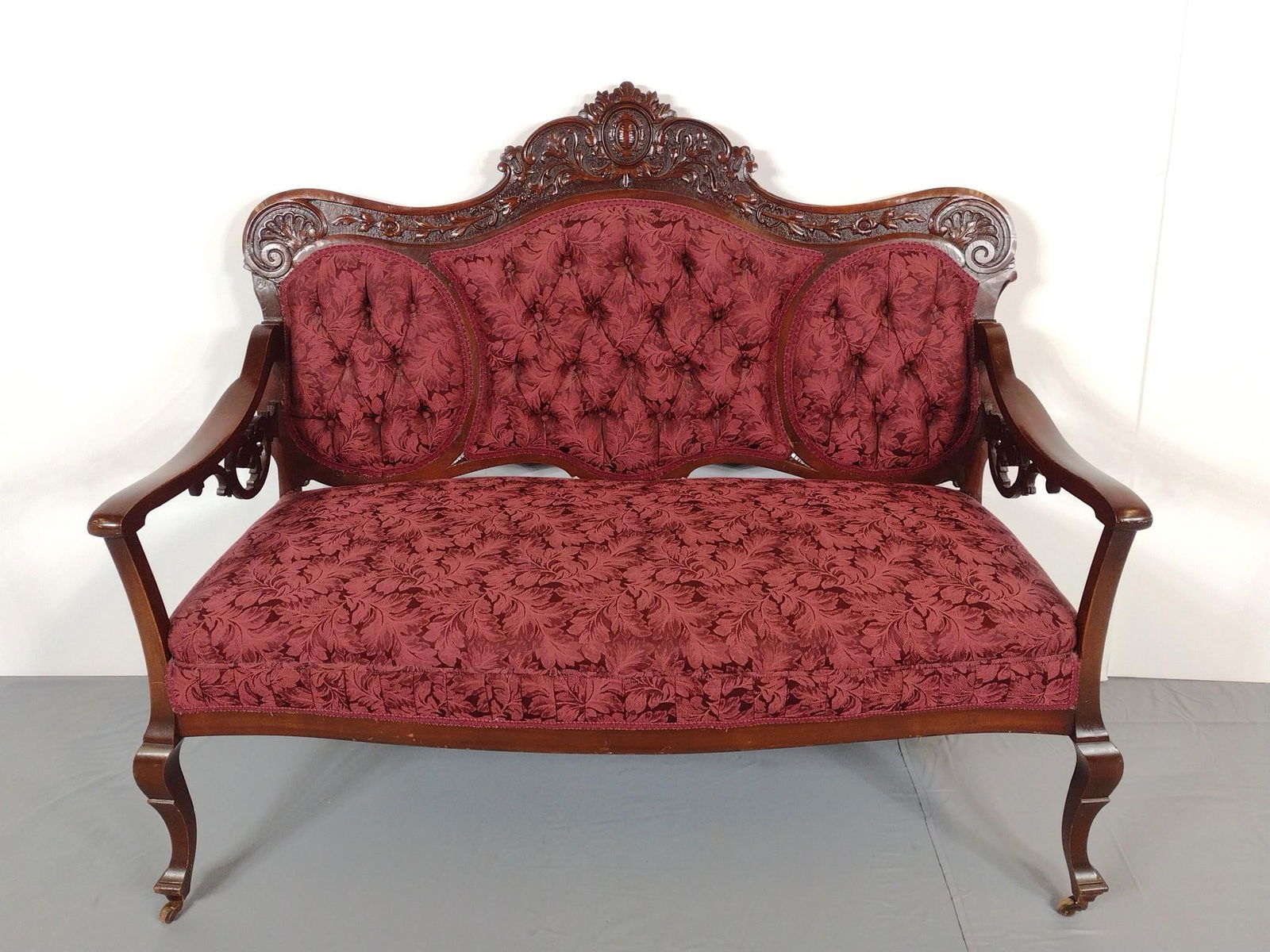 Victorian Settee: NOT ELIGIBLE FOR IN-HOUSE SHIPPING. 51" wide X 24" deep X 42" high. Has a few light scratches. Backrest has repair on one side