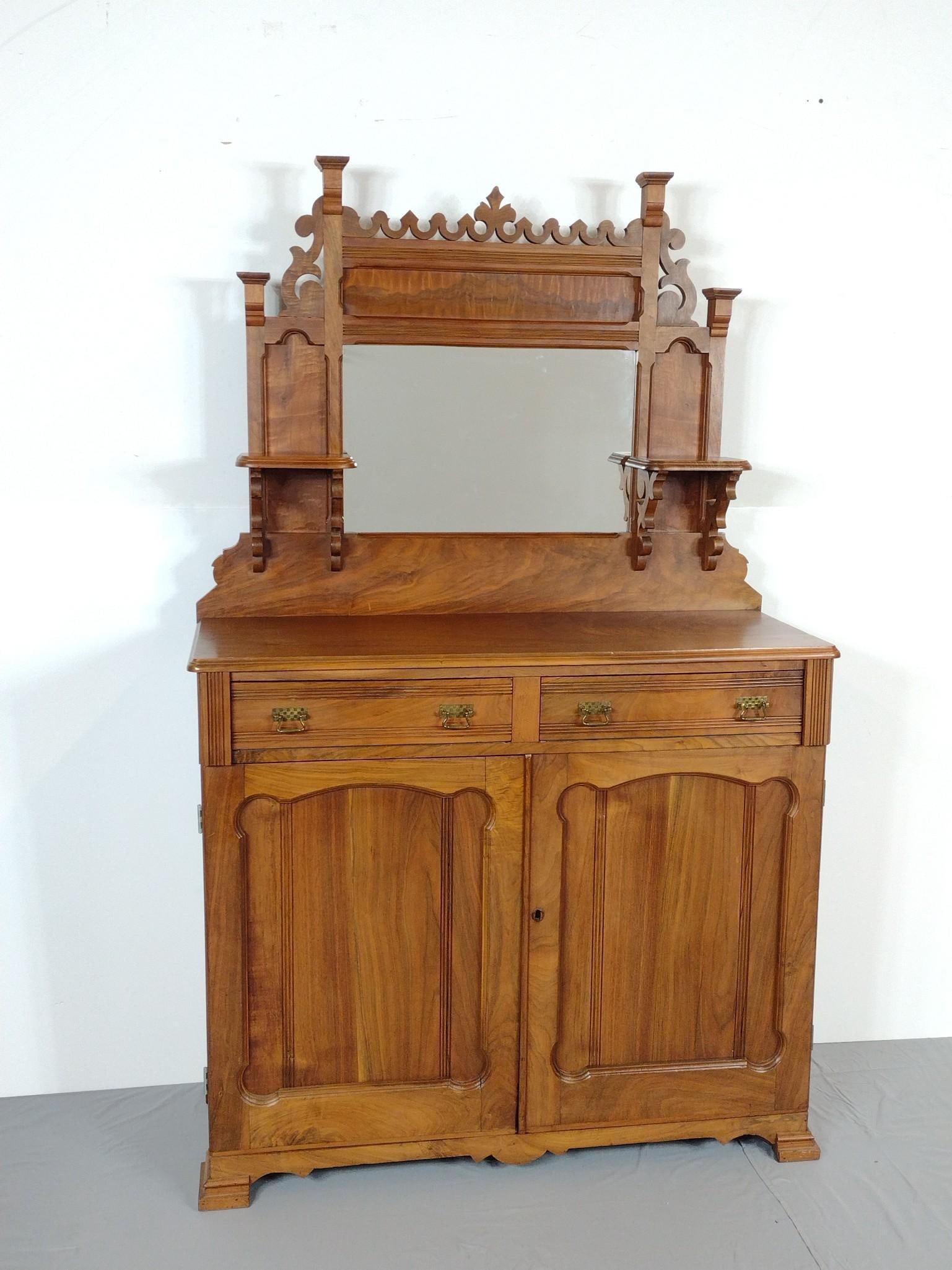 Victorian Carved Mirrored Sideboard: NOT ELIGIBLE FOR IN-HOUSE SHIPPING. 46-1/2" wide X 17-1/2" deep X 74-1/2" high. Has a few scratches.