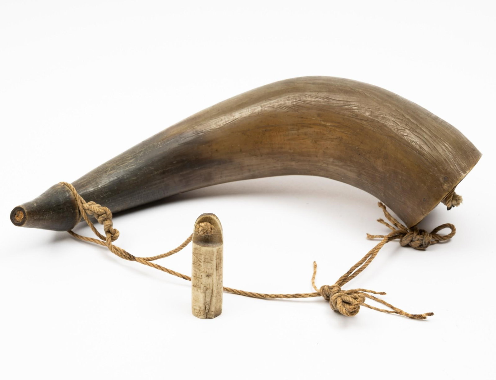 Animal Horn Powder Horn: Broken cork. 2-3/4" wide x 9-1/2" long.