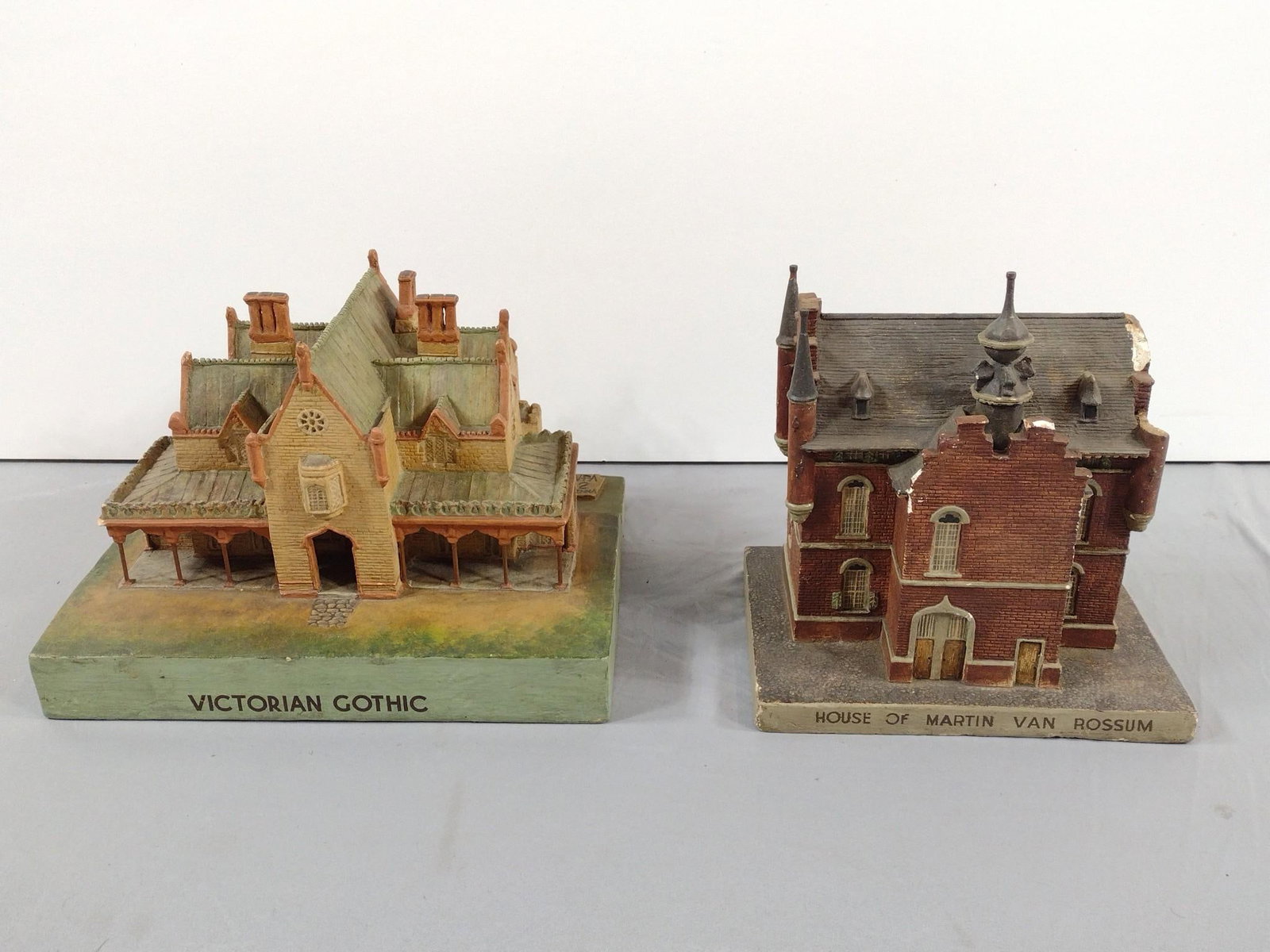 2 House Models incl. WPA: NOT ELIGIBLE FOR IN-HOUSE SHIPPING. 8-3/4" to 12-1/4" wide x 6-1/2" to 10-1/4" deep x 8-1/2" to 9" high. Some losses to one house.