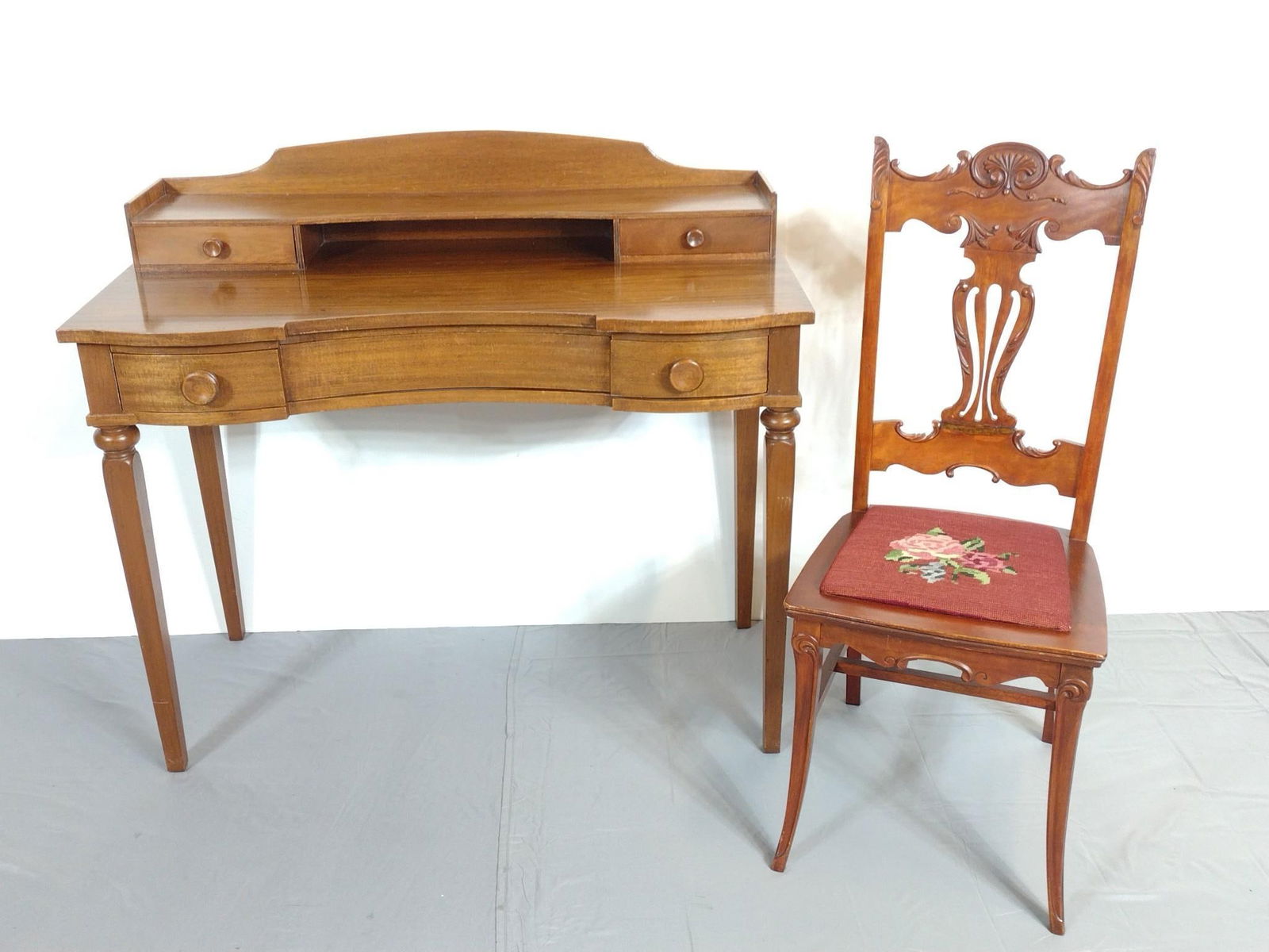 Writing Desk and Needlepoint Chair: NOT ELIGIBLE FOR IN-HOUSE SHIPPING. Desk 41" wide X 20" deep X 37" high. Chair 16" wide X 16" deep X 38" high. Both have some light scratches.