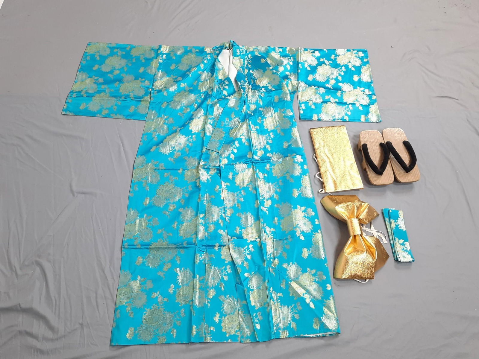20th C Japanese Silk Kimono with Accessories: Includes silk kimono, sash with bow, two fans, tabi and sandals. Kimono in original box. Shoes 9-1/2 inch. Kimono box 14-1/2" square. Wear to boxes.