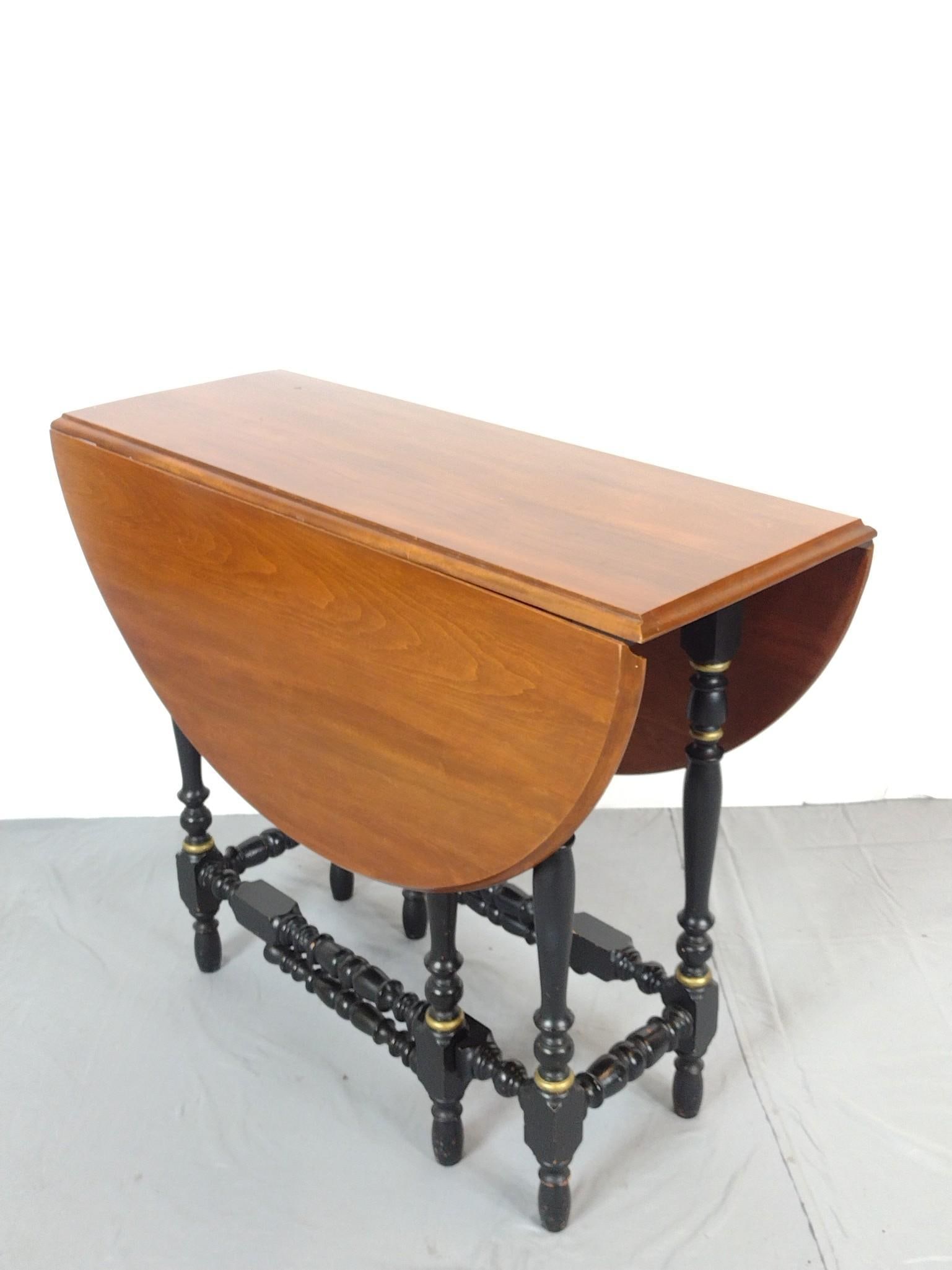 Gate Leg Table: NOT ELIGIBLE FOR IN-HOUSE SHIPPING. Open 45", closed 14-1/2" wide X 36" deep X 30" high. Has some light scratches.