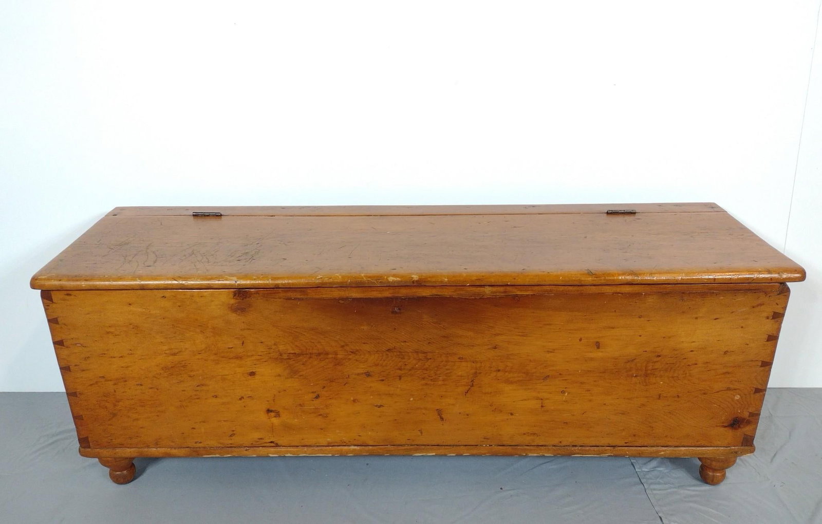 Blanket Chest: NOT ELIGIBLE FOR IN-HOUSE SHIPPING. 55" wide X 14-1/2" deep X 20" high. Has some scratches and finish loss.