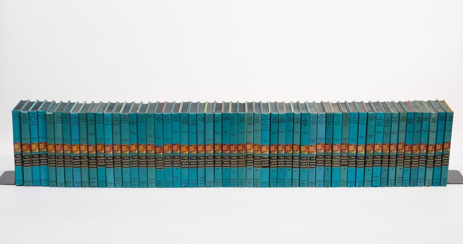 Vol 1-54 The Hardy Boys Series: Hardback. Copyright 1959 - 1975. Grosset and Dunlap Publishers. New York. Minor wear consistent with age and use.