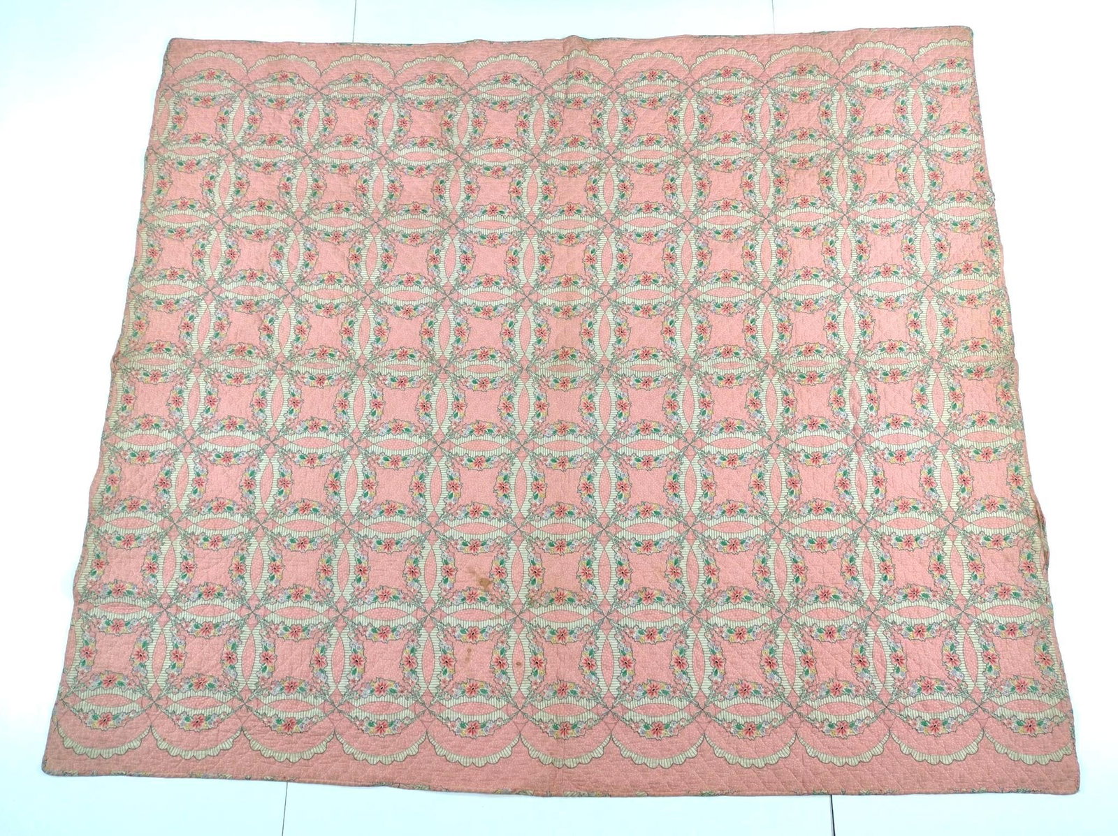 Vintage Ring Quilted Blanket: 7'7" long X 6'9" wide. Has some damage around edge.