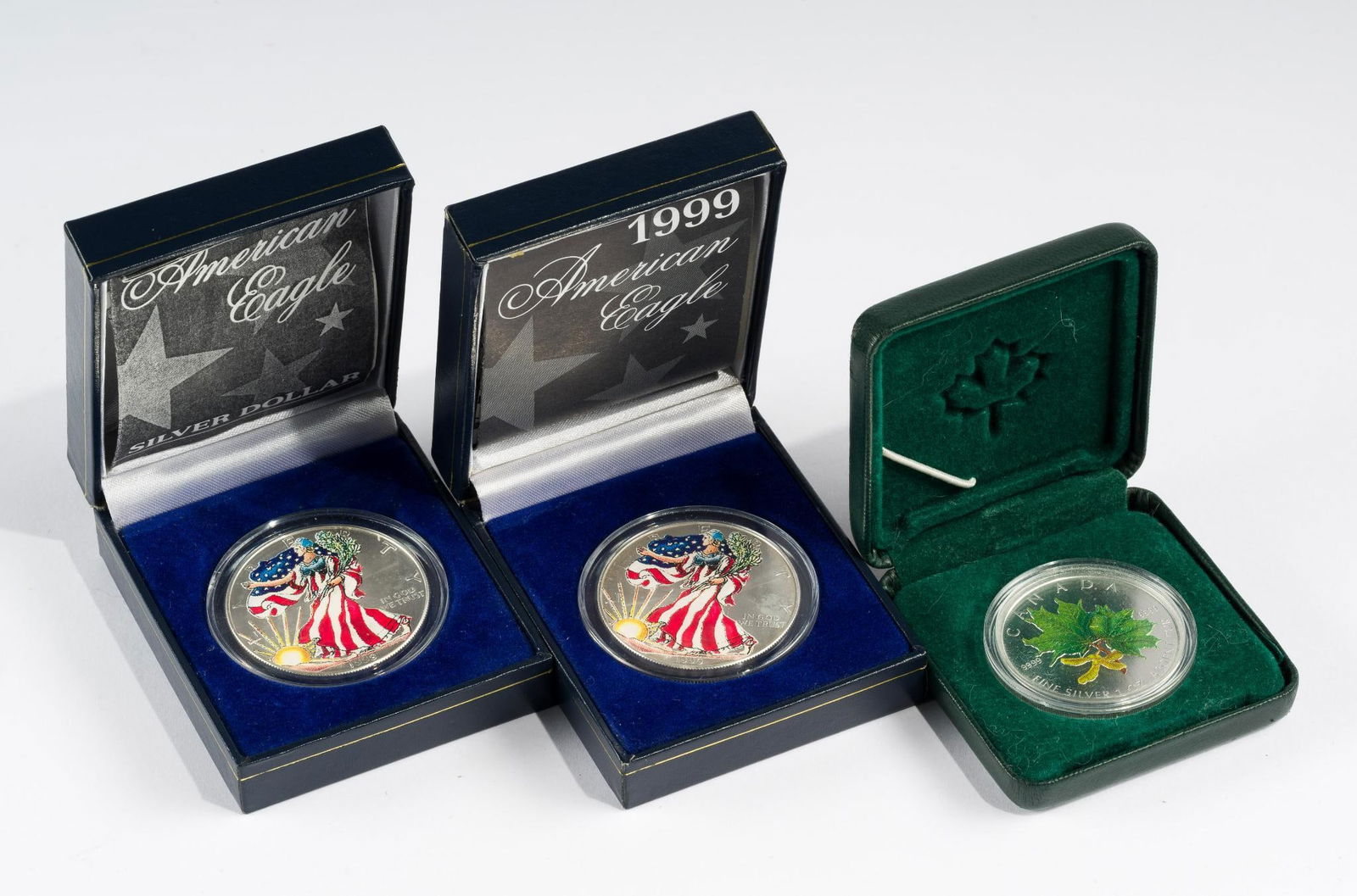 Two American Eagle Silver Dollars and Canada $5 Maple Leaf (1 of 4)