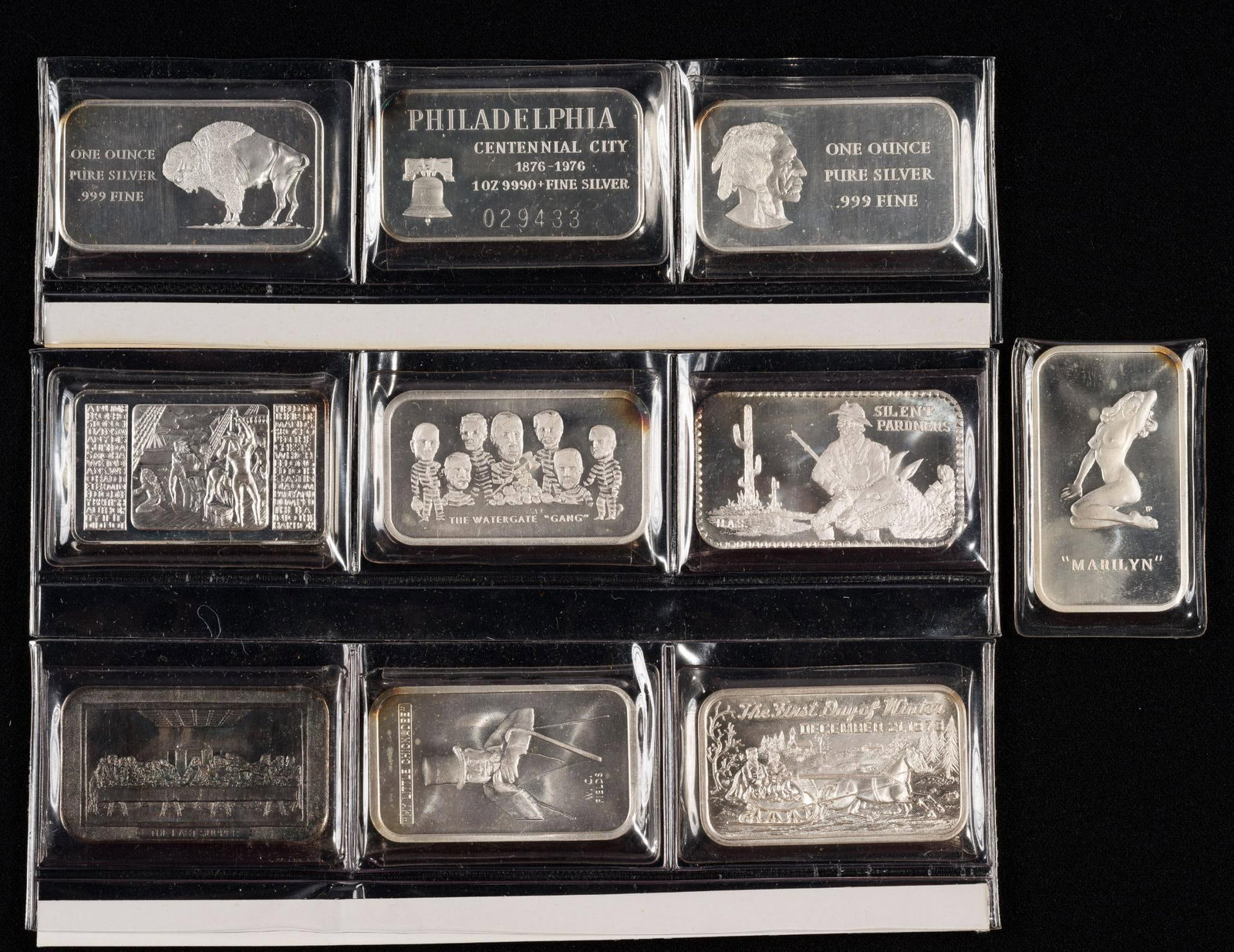 1970's .999 Fine Silver Bar Collection: Ten silver bars including Colonial Mint 1973 Marilyn - nude Marilyn Monroe, Watergate Gang, Mount Everest Mint Boston Tea Party, W. C. Fields My Little Chickadee, others