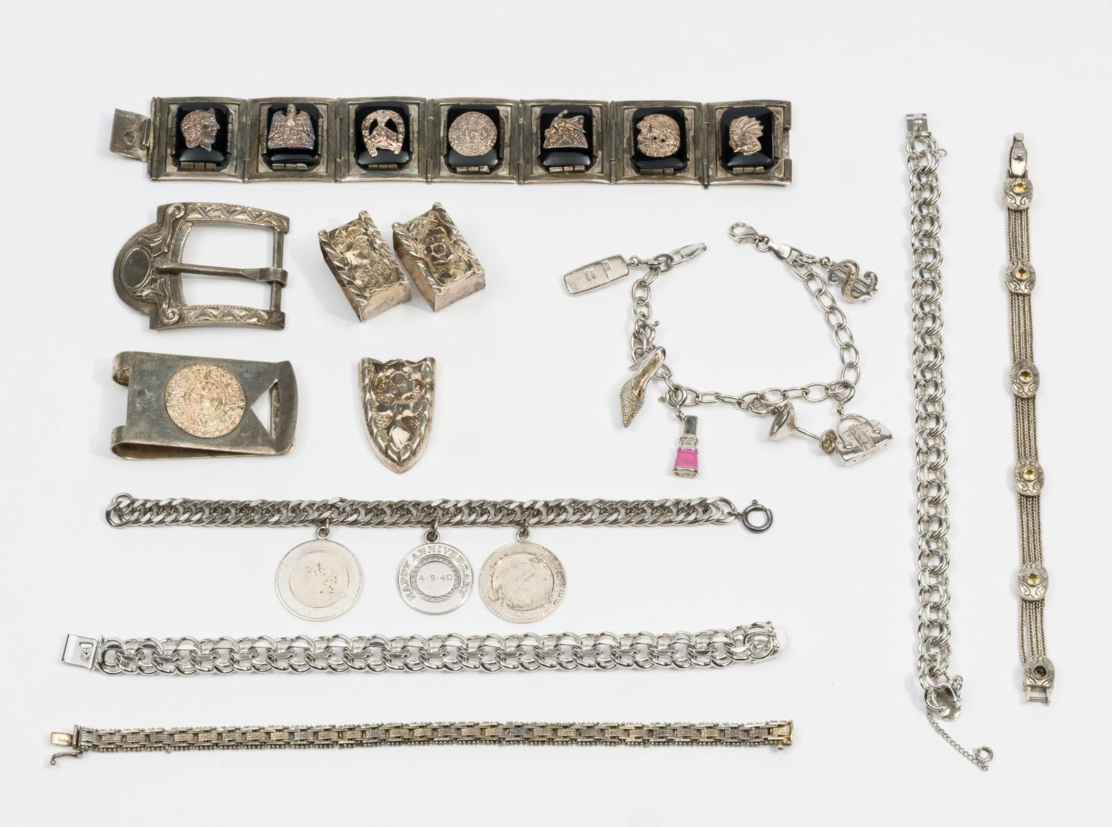 Sterling Silver Jewelry Incl Charm Bracelets: Charm bracelets, some with sterling charms, other bracelets including Mexico sterling plate bracelet with onyx and gilt decorations. Seven bracelets ranging 7" to 7 3/4", all in sterling. Four sterlin