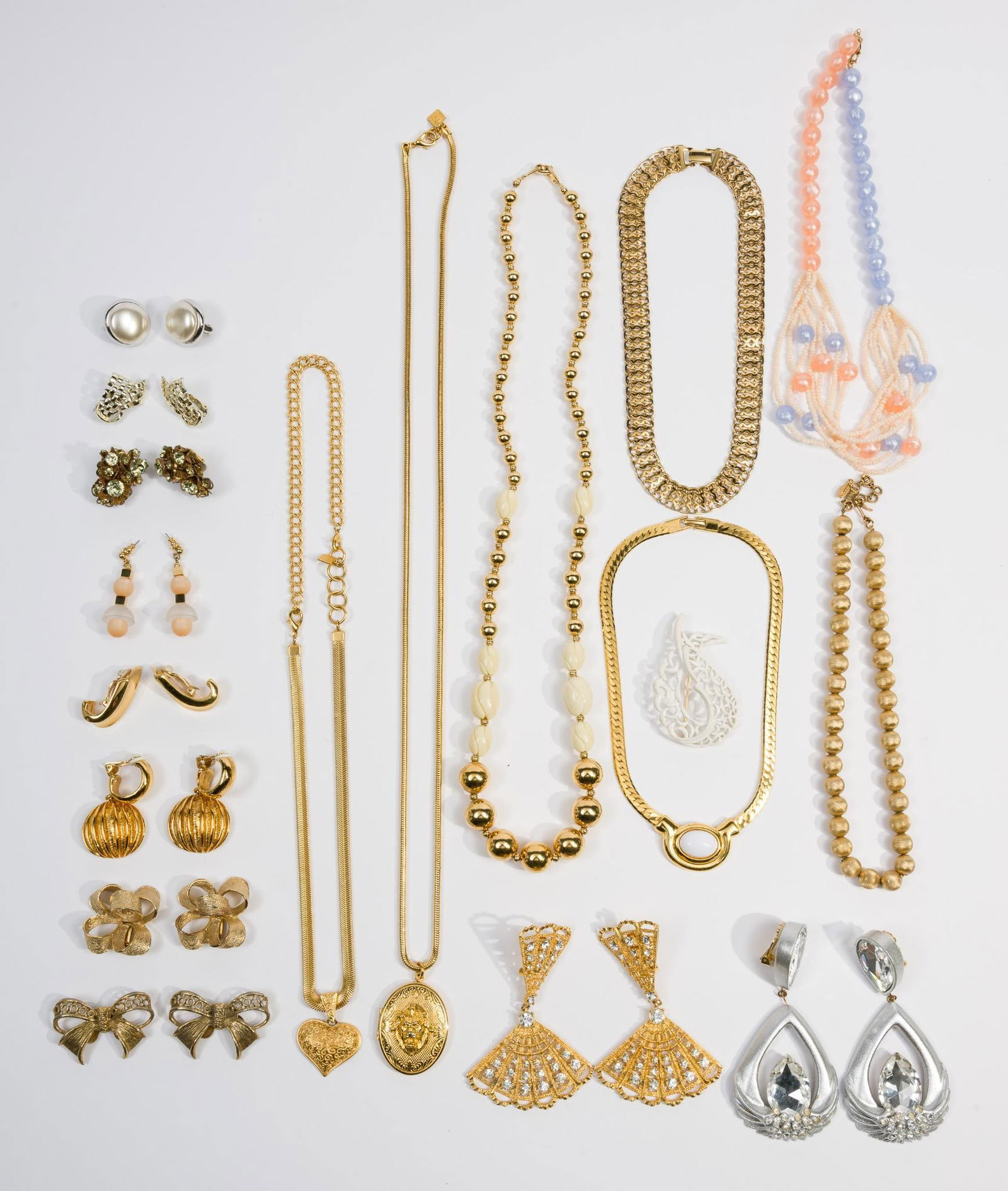 Grouping of Costume Jewelry: Includes two Anne Klein necklaces, two pairs of shoe clips incl Musi, earrings including Ivana, Coro basketweave, and Trifari. Necklaces 24" to 34" long.
