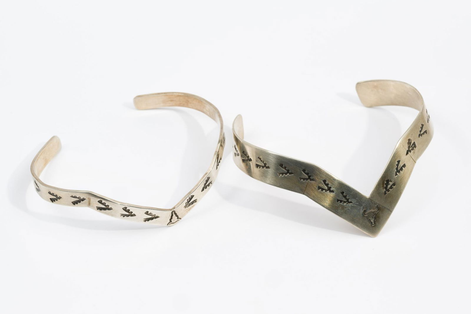 2 Nordic Pine Chevron Cuff Bracelets: Custom handmade sterling silver bracelets with stampings. 1/4" width and 3/8" width, both 2-1/4" interior. Includes gift box. Total weight is 0.7 troy ounces.