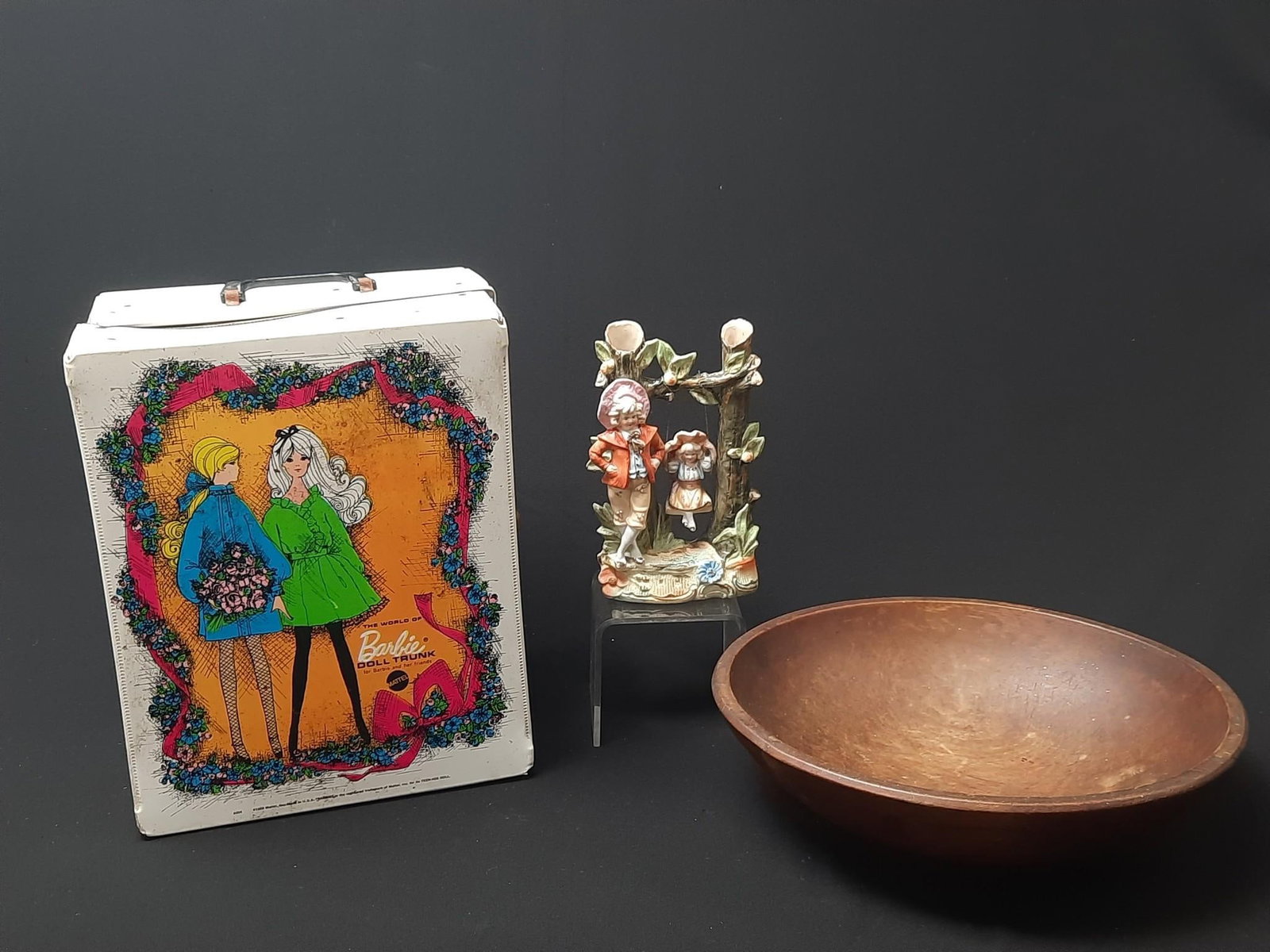 Wood Bowl, Porcelain Figurine, and Barbie Collectibles: Also includes porcelain figurine & Barbie travel case with Barbie and accessories. 4-1/2" to 13-1/4" wide x 3-1/2" to 7-3/4" high.