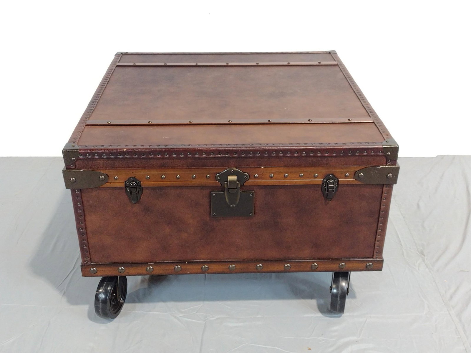 Furniture Industries Inc Rolling Trunk Table: NOT ELIGIBLE FOR IN-HOUSE SHIPPING. 30" wide X 30" deep X 20" high. Has some light scratches.