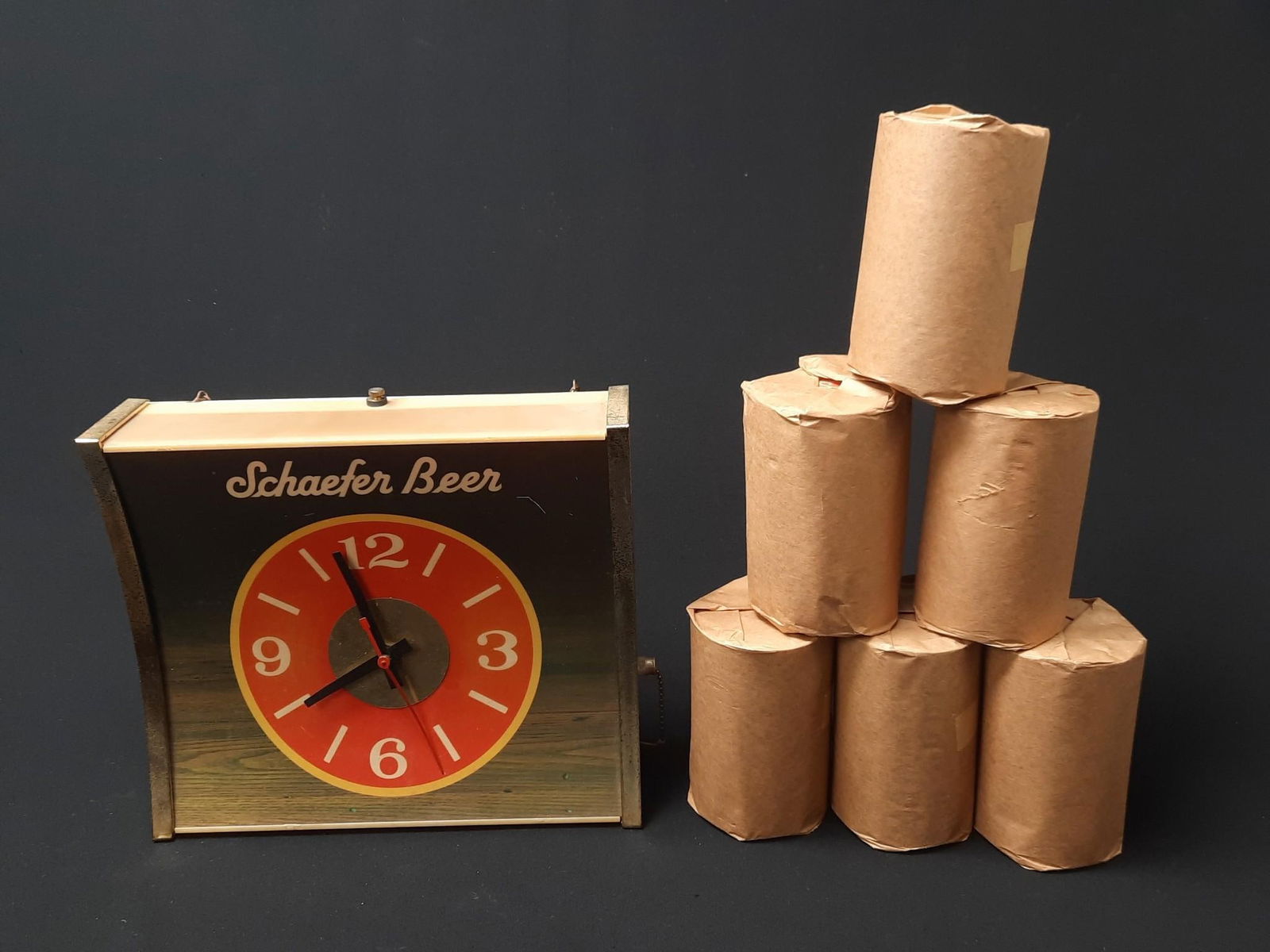 Shaefer Beer Clock & 6 Packs Shaefer Coasters: 5 packs of coasters factory sealed. Clock measures 12-1/4" wide x 10-3/4" high.
