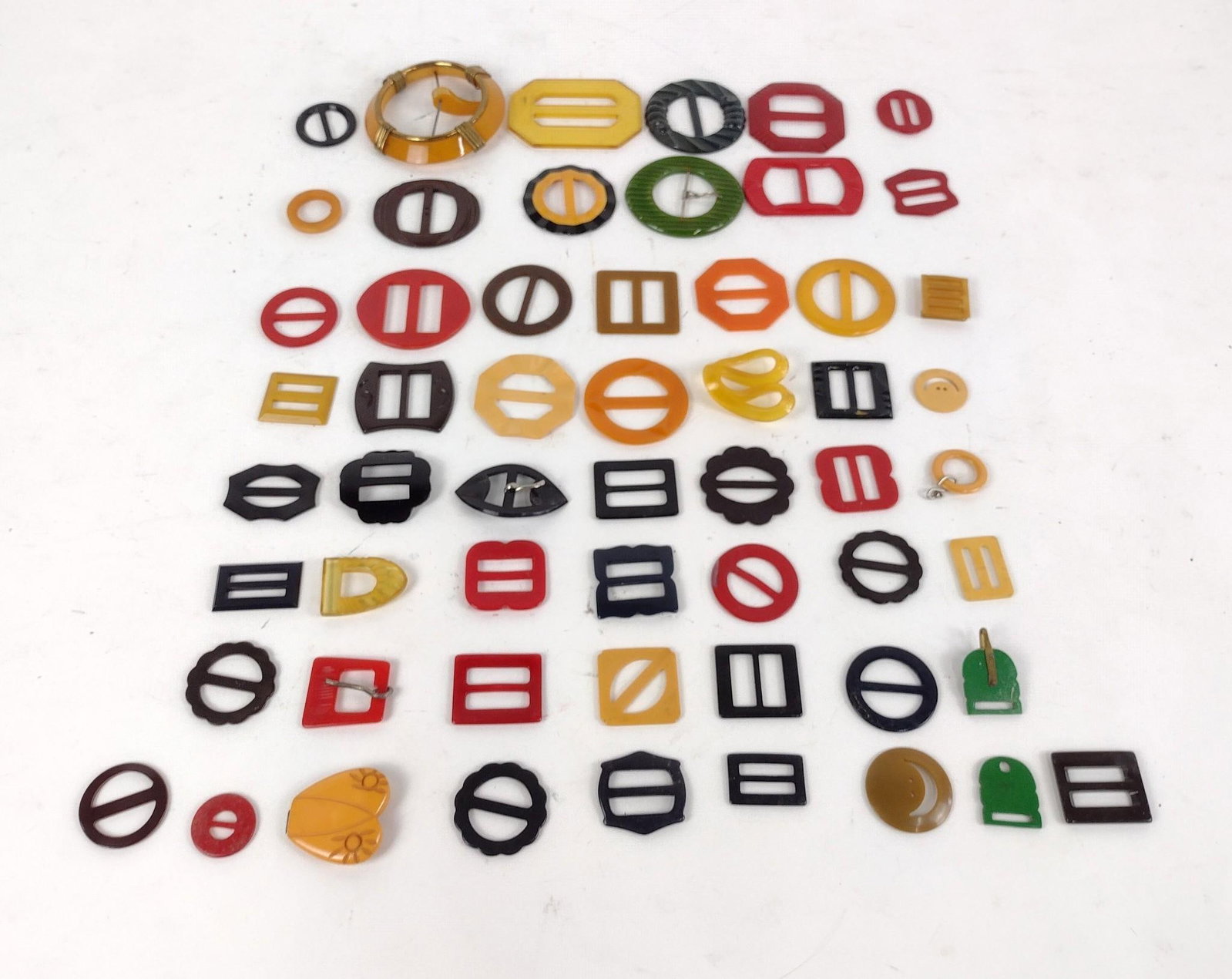 56 Bakelite and Lucite Buckles: 1" to 3-1/2".