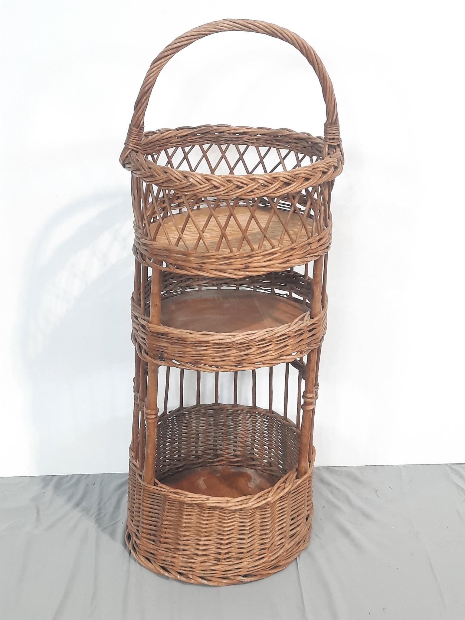 3 Tier Basket: NOT ELIGIBLE FOR IN-HOUSE SHIPPING. Overall 12" diameter x 33" high. Some wear consistent with age and use.