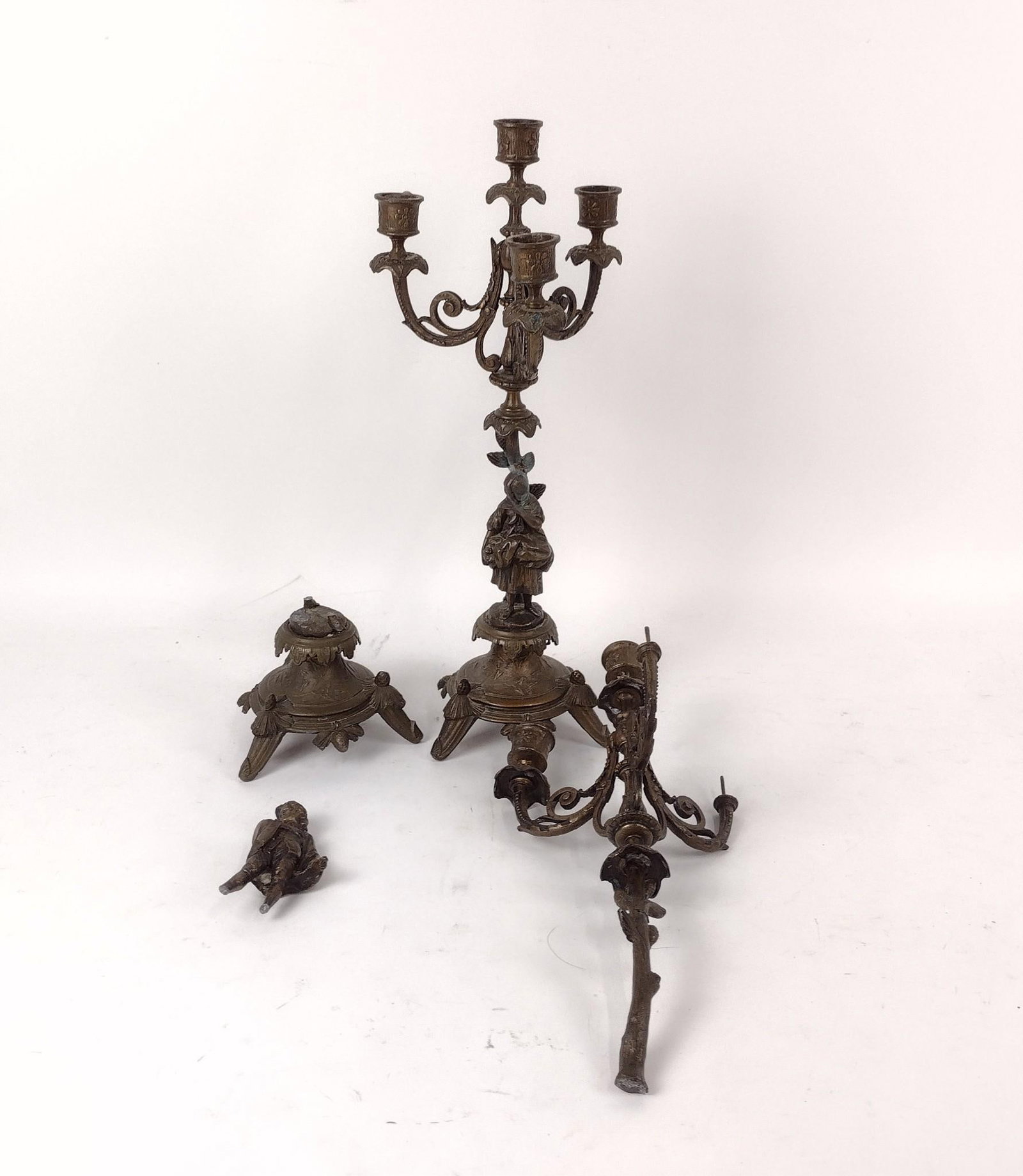 2 Brass Candelabra: One broken. 5-1/2" wide x 17-3/4" long.