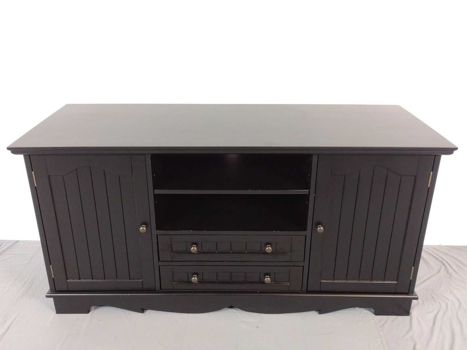 TV Stand: NOT ELIGIBLE FOR IN-HOUSE SHIPPING. 53" wide X 20" deep X 26" high. Has a few light scratches.