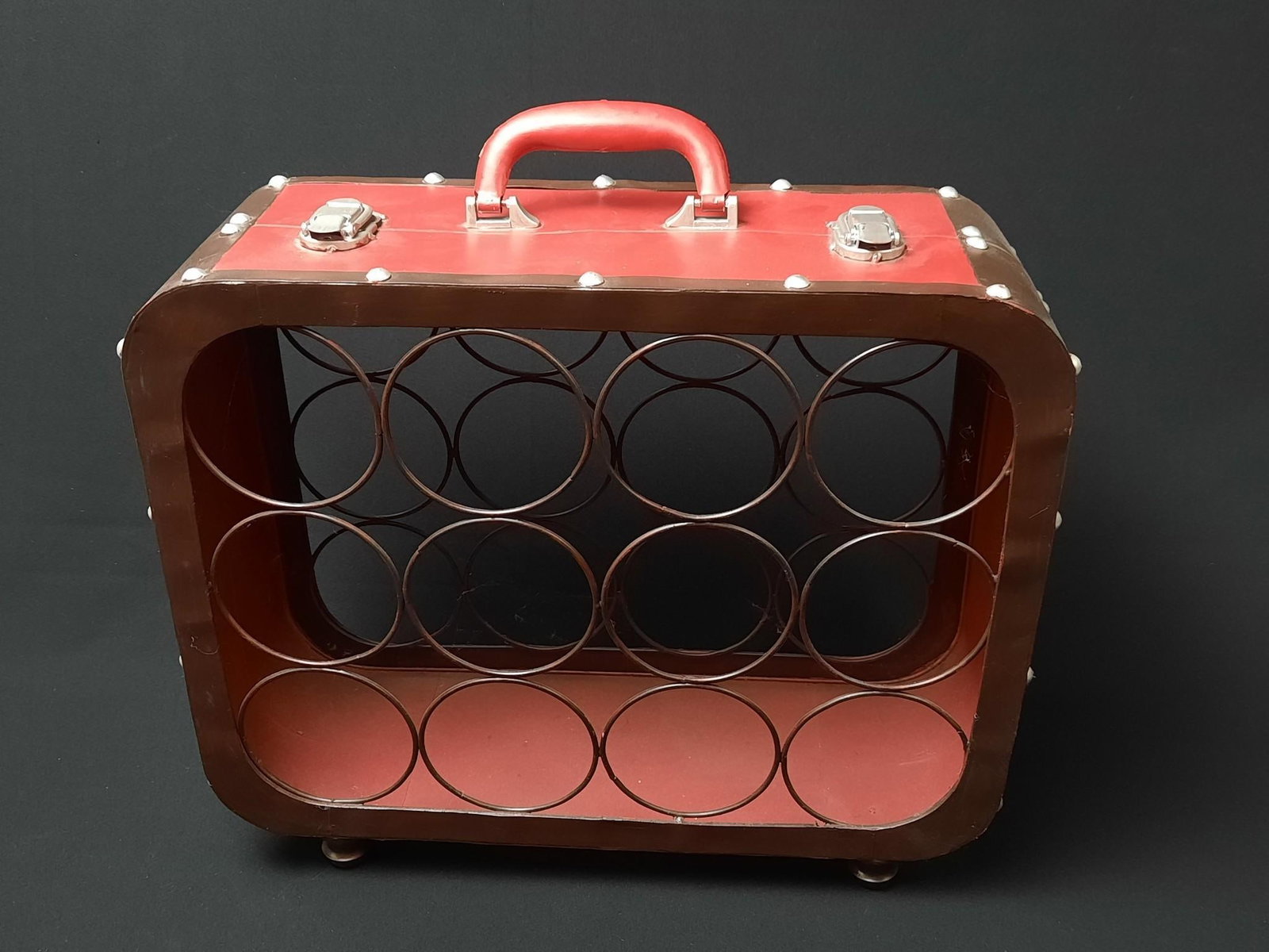 Luggage Style Wine Holder: 18" wide x 6-1/2" deep x 16-1/2" high. Holds 12 bottles of wine. Minor wear consistent with age and use.