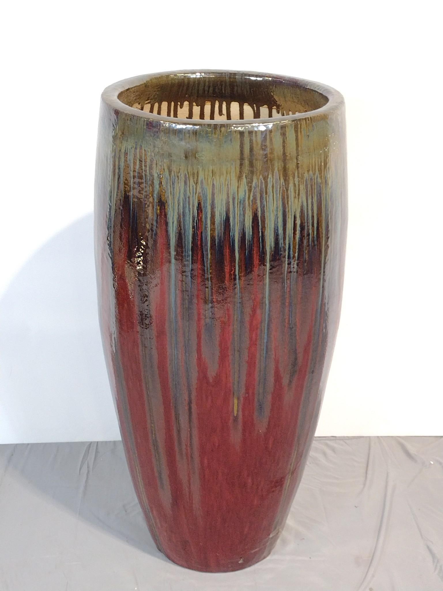 40" Ceramic Planter: 18" diameter X 40" high.