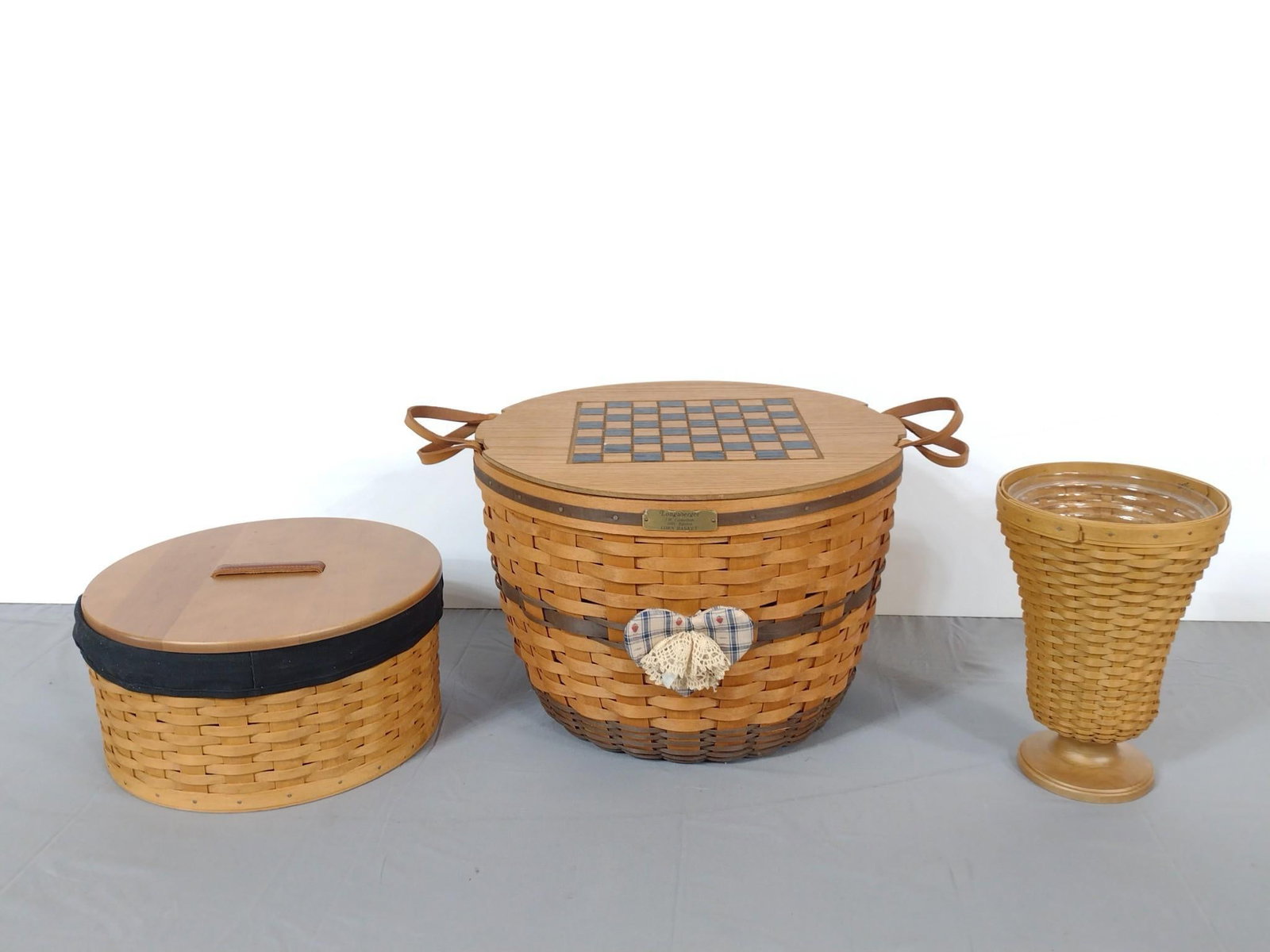 3 Longaberger Baskets: 7-1/2" to 17" wide x 10-3/4" to 11-3/4" high.