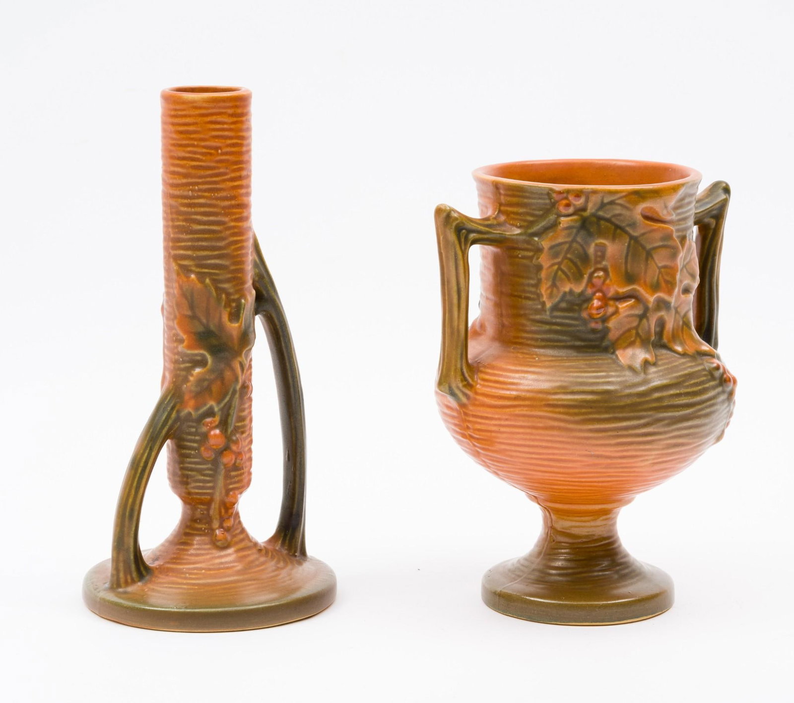2 Roseville Bushberry Vases: 3-3/4" to 5" wide x 6-1/4" to 7-1/2" high.
