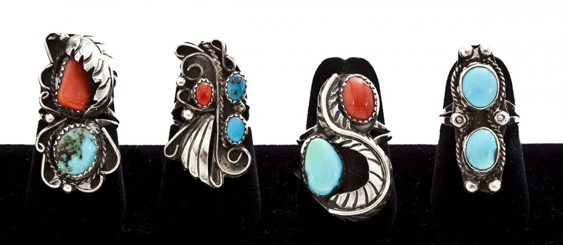 4 Navajo Silver & Stone Rings: DESCRIPTION: Four Navajo silver and stone rings. Includes: 1) Feather ring with carnelian and turquoise stones. Size 8. 2) Ring with turquoise and carnelian stone and an applied leaf design. Size 5-1/