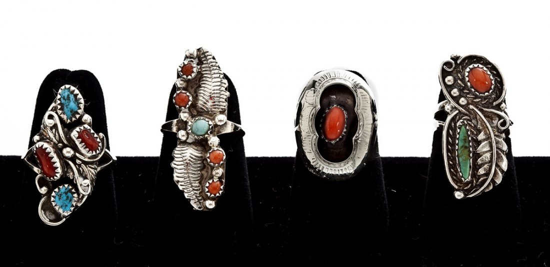 4 Navajo Silver & Stone Rings: DESCRIPTION: Four Navajo silver and stone rings. Includes: 1) Ring with two carnelian and turquoise stones. Marked "L." Size 9. 2) Ring with decorative applied design and turquoise and carnelian stone