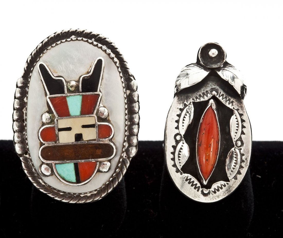 2 Navajo & Zuni Silver & Stone Rings: DESCRIPTION: Two Navajo and Zuni silver and stone rings. Includes: 1) Etched and carved ring with central carnelian stone. Size 8. 2) Ring with various stones including mother of pearl, carnelian, tur