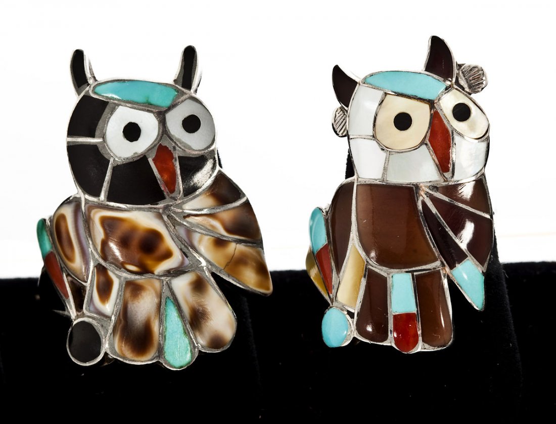 2 Zuni Silver & Stone Figural Rings: DESCRIPTION: Two Zuni silver and stone figural rings each shaped as an owl with various stones including turquoise, onyx, mother of pearl, and carnelian. Size 5 and 5-1/2.