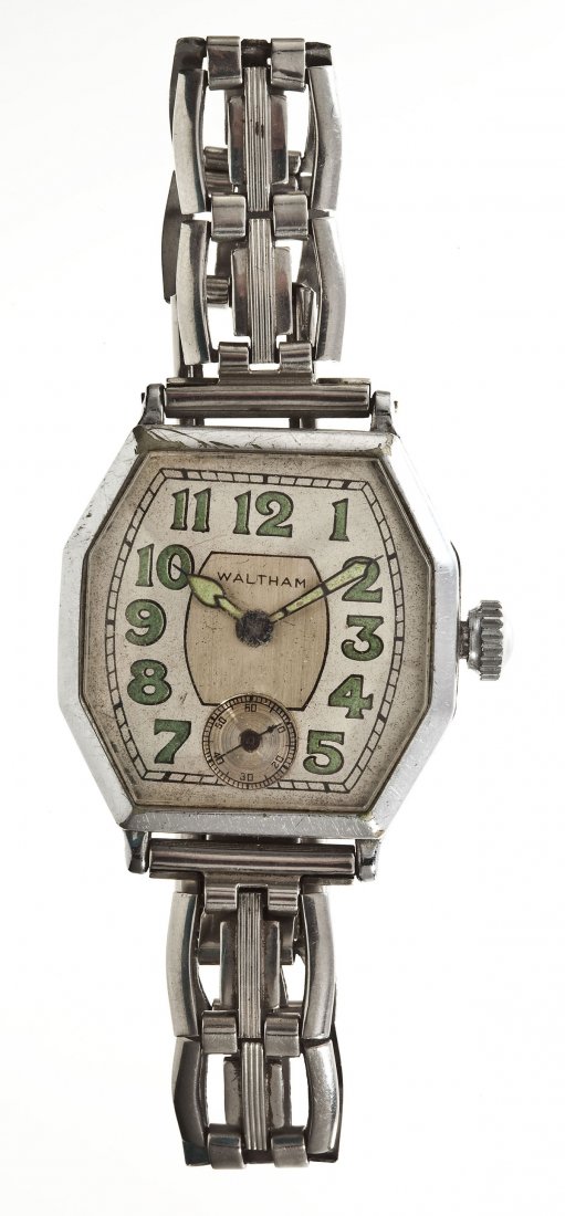 Waltham Deco Wristwatch: DESCRIPTION: Waltham Deco wristwatch. Maxine shaped white and silver dial with subsidiary seconds, radium hands and numerals, marked "Waltham". 3/4 plate movement marked "American Waltham Watch Co. Sa