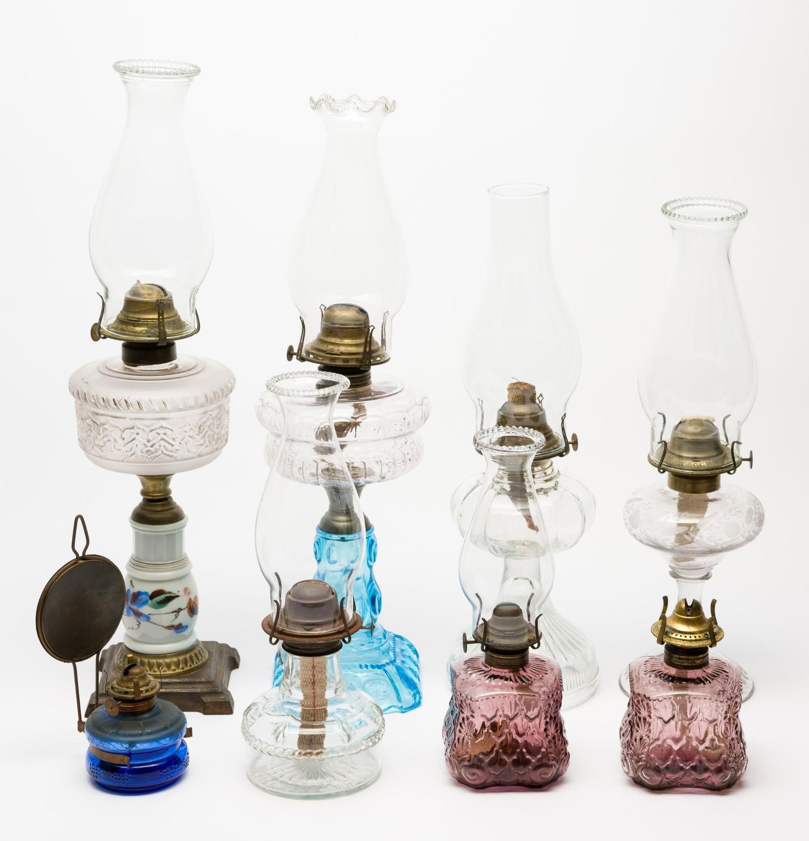 8 Glass Oil Lamps: 3-1/4" to 5-3/4" wide x 8" to 13" high.