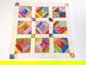 Vibrant Patchwork Crib Quilt