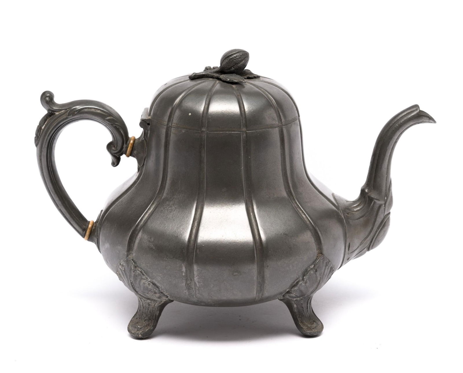 Victorian Sheffield Pewter Pumpkin Teapot: Marked Thomas Otley Britania Metal. With acorn finial. Handle has two round carved bone pieces. Some metal petina loss, but overall good condition. Approx 7" wide x 8" tall.