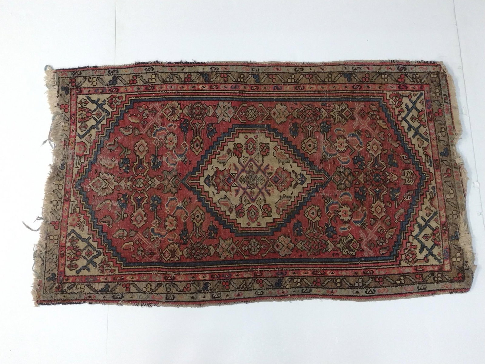 Small Area Rug: NOT ELIGIBLE FOR IN-HOUSE SHIPPING. 2'8" wide X 4'7" long. Has some losses at both ends