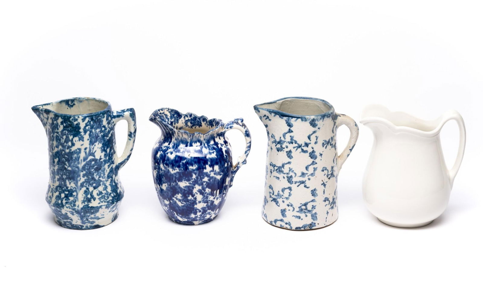 4 Spongeware Pitchers (1 of 9)