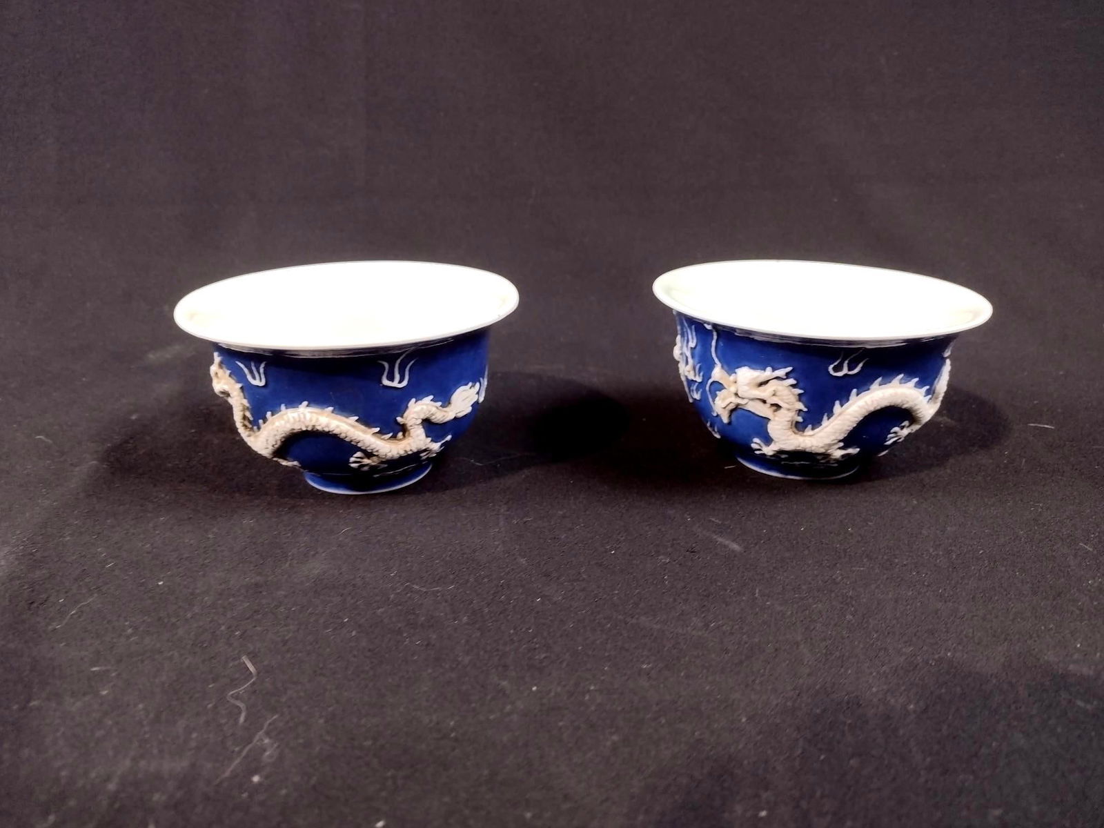Pair of Chinese High Relief Dragon Cups (1 of 2)