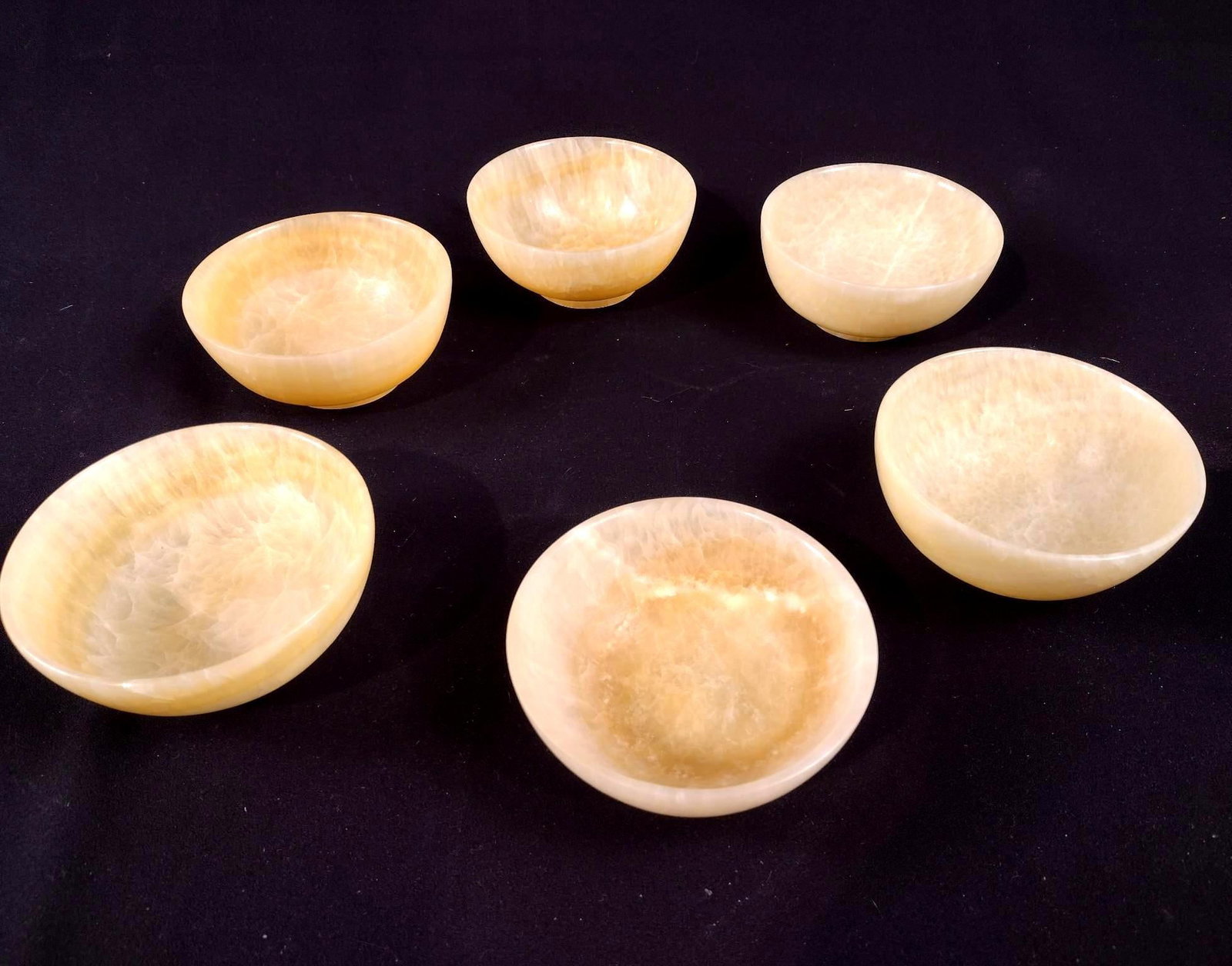 Set of 6 Yellow Agate Bowls: No mark. Each 4-1/4" diameter.