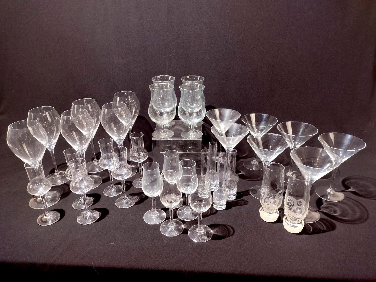 43 Pcs Glassware: 1-1/2" to 3-1/2" wide x 5-3/4" to 9" high.